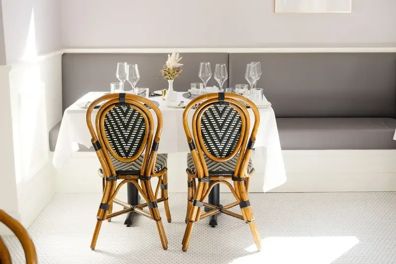 Elegant bistro-style dining room at Lilac Montecito, offering a cozy atmosphere for dinner on Coast Village Road.