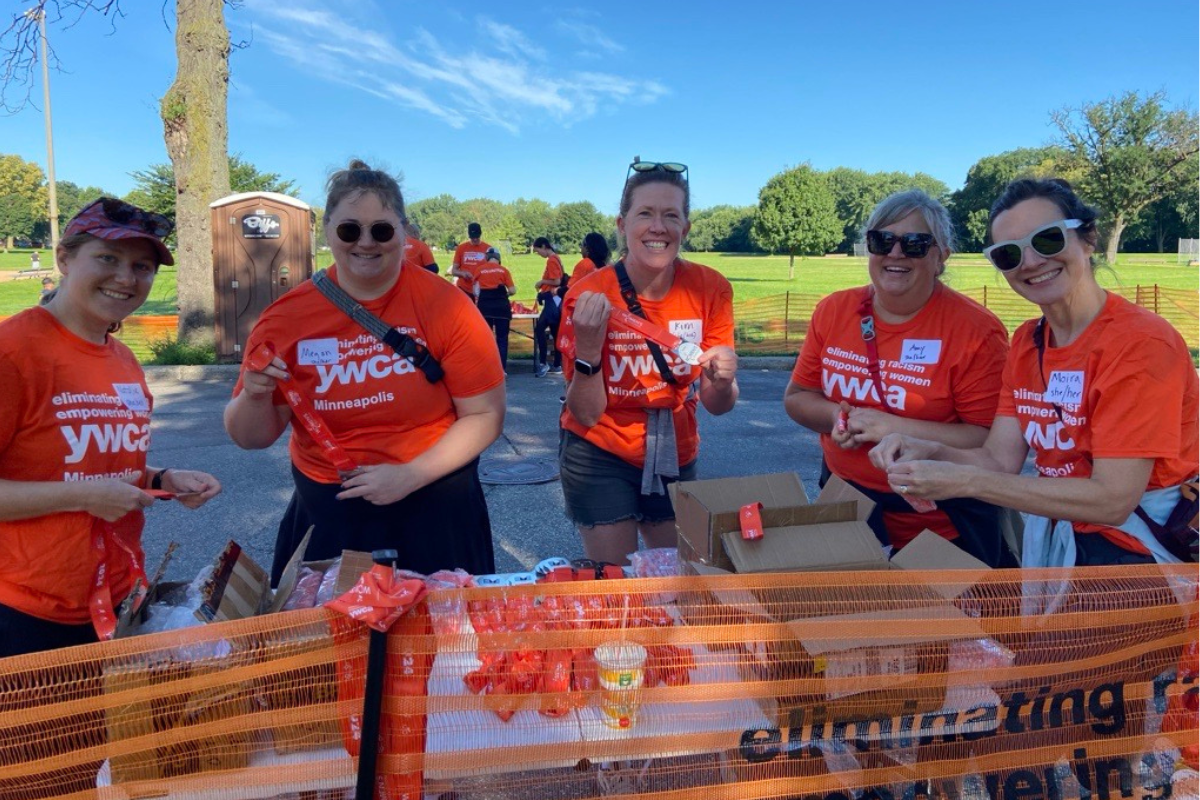 Group of volunteers with finisher medals