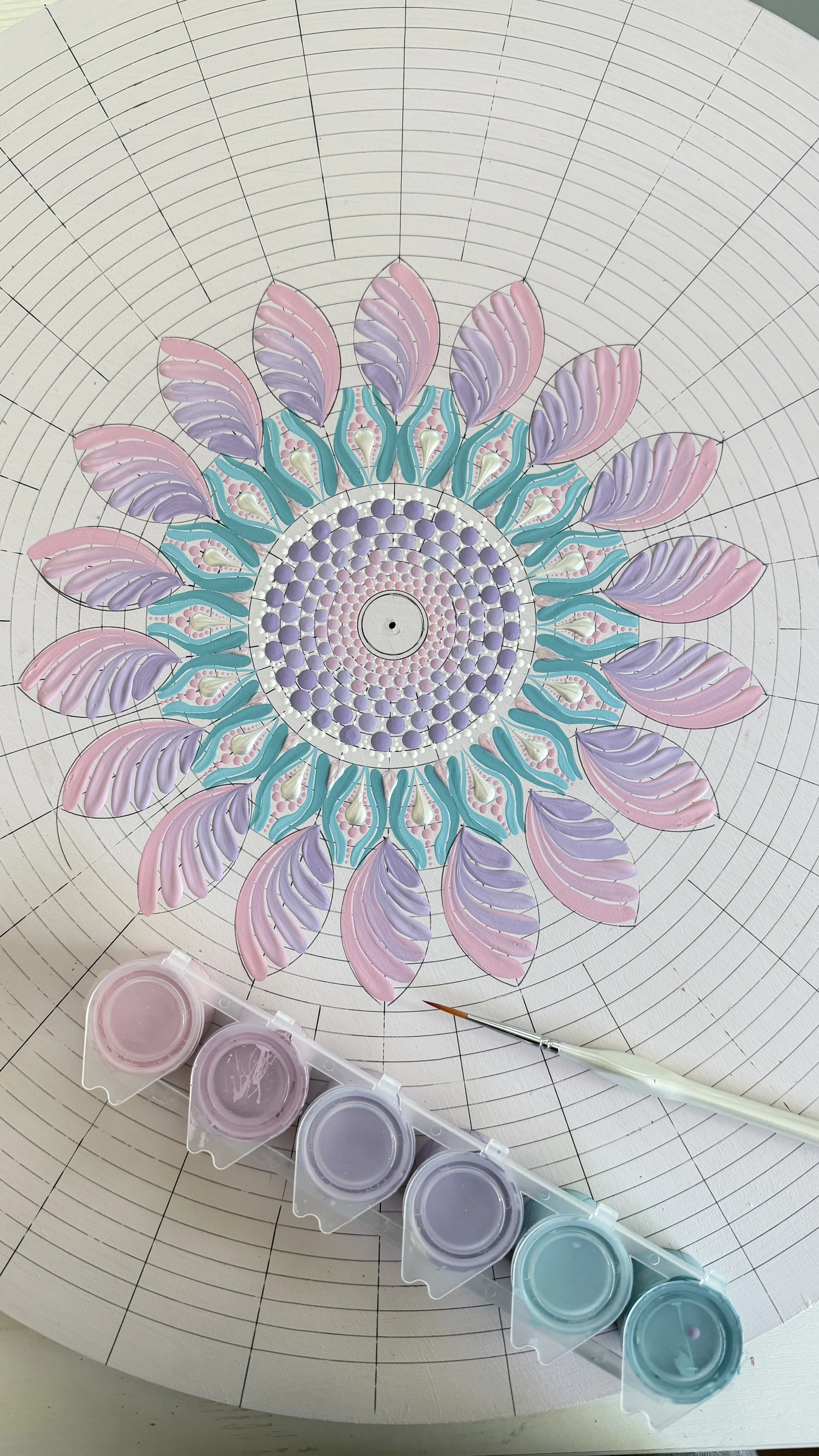 Practising brushstrokes on worksheets