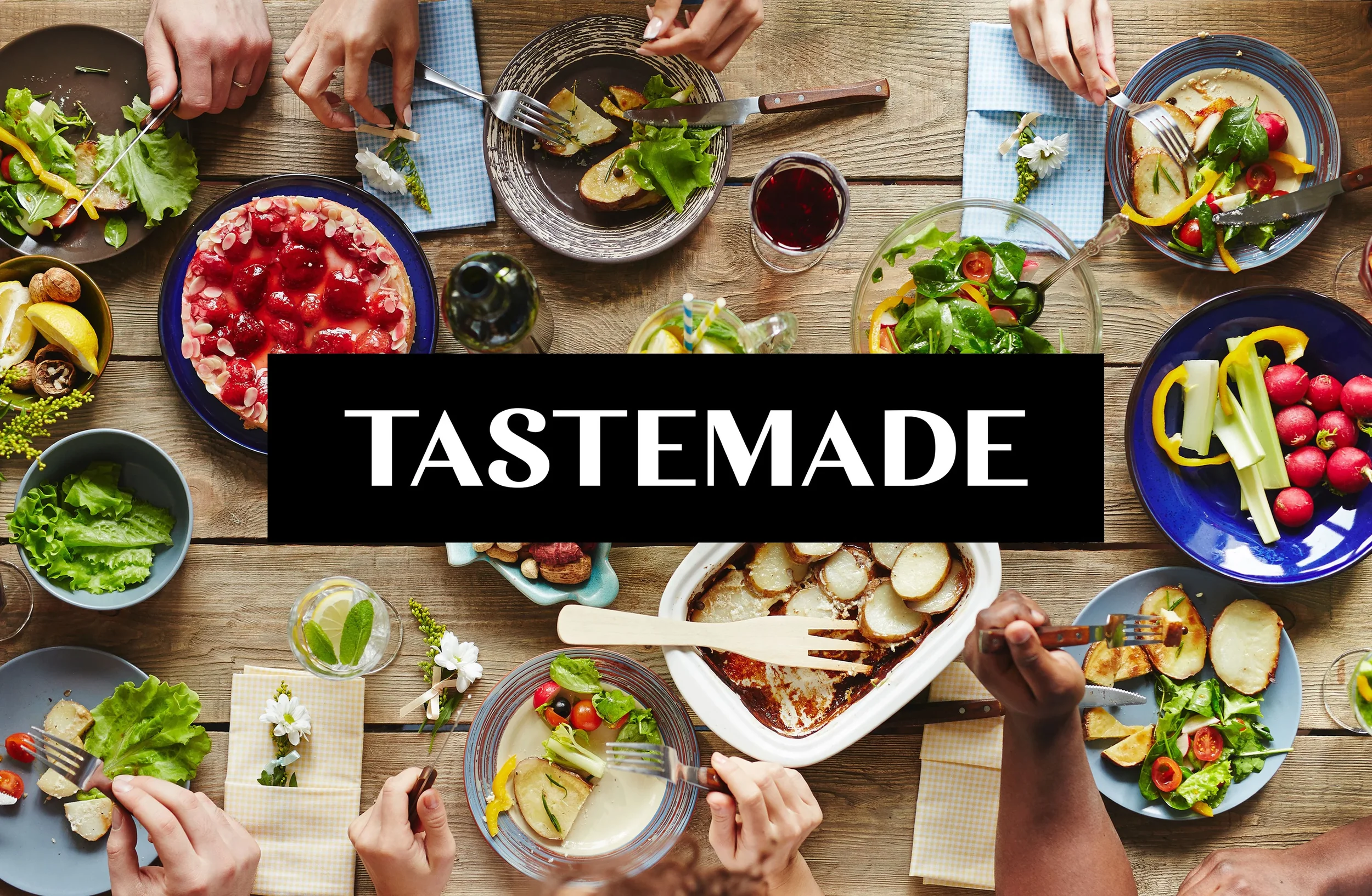 Table with various dinner items laid out. Tastemade logo in the middle.