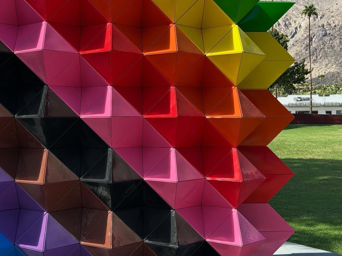 The amazing details of the Palm Springs Pride Monument by artist @jimisermann  This artwork just keeps giving!  Take a minute, zoom in, and read the plaque.  The artwork is composed of 720 identical stainless steel modules each #lasercut folded tig w