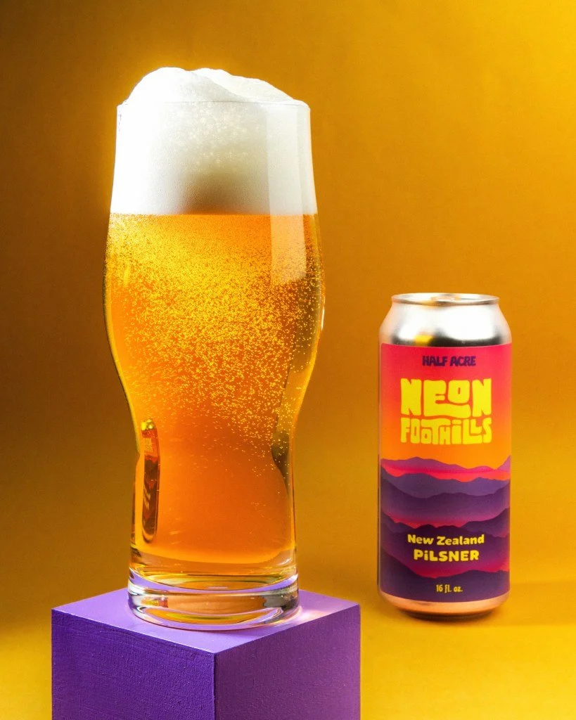 Neon Foothills ✨ @halfacrebeer 
Over the river and through the New Zealand foothills, to craft beer perfection we go! Half Acre does it again with this New Zealand Pilsner!

A clean malt profile with a sparkling crystal pour are the highlights of thi