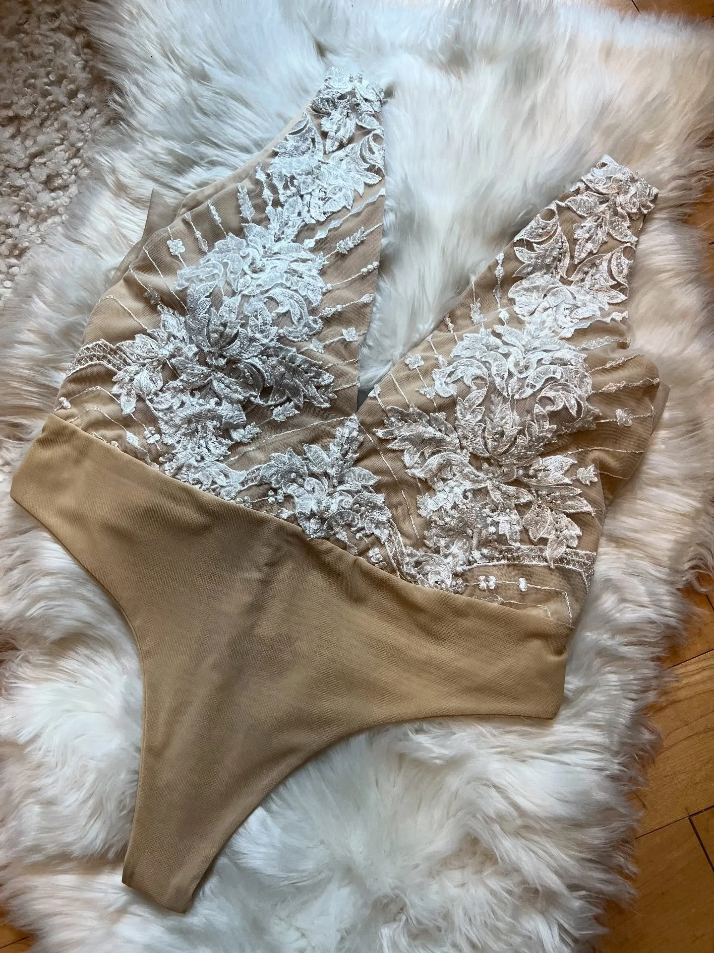 ✔️Bodysuit 
✔️Ceremony Skirt 
✔️Reception Skirt 
✔️Bridal Belt 
✔️Veil 
✔️Shoes 

Complete Custom look!