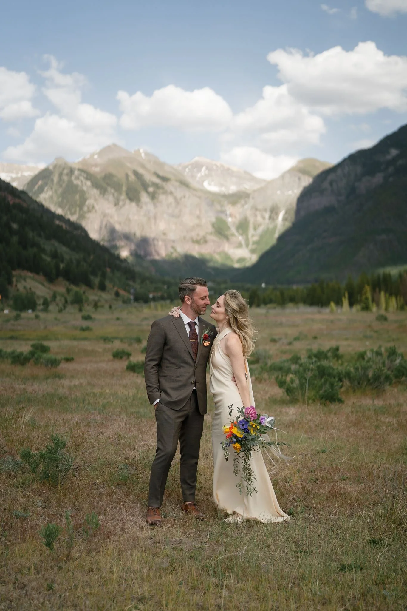 bride and groom in the Telluride valley