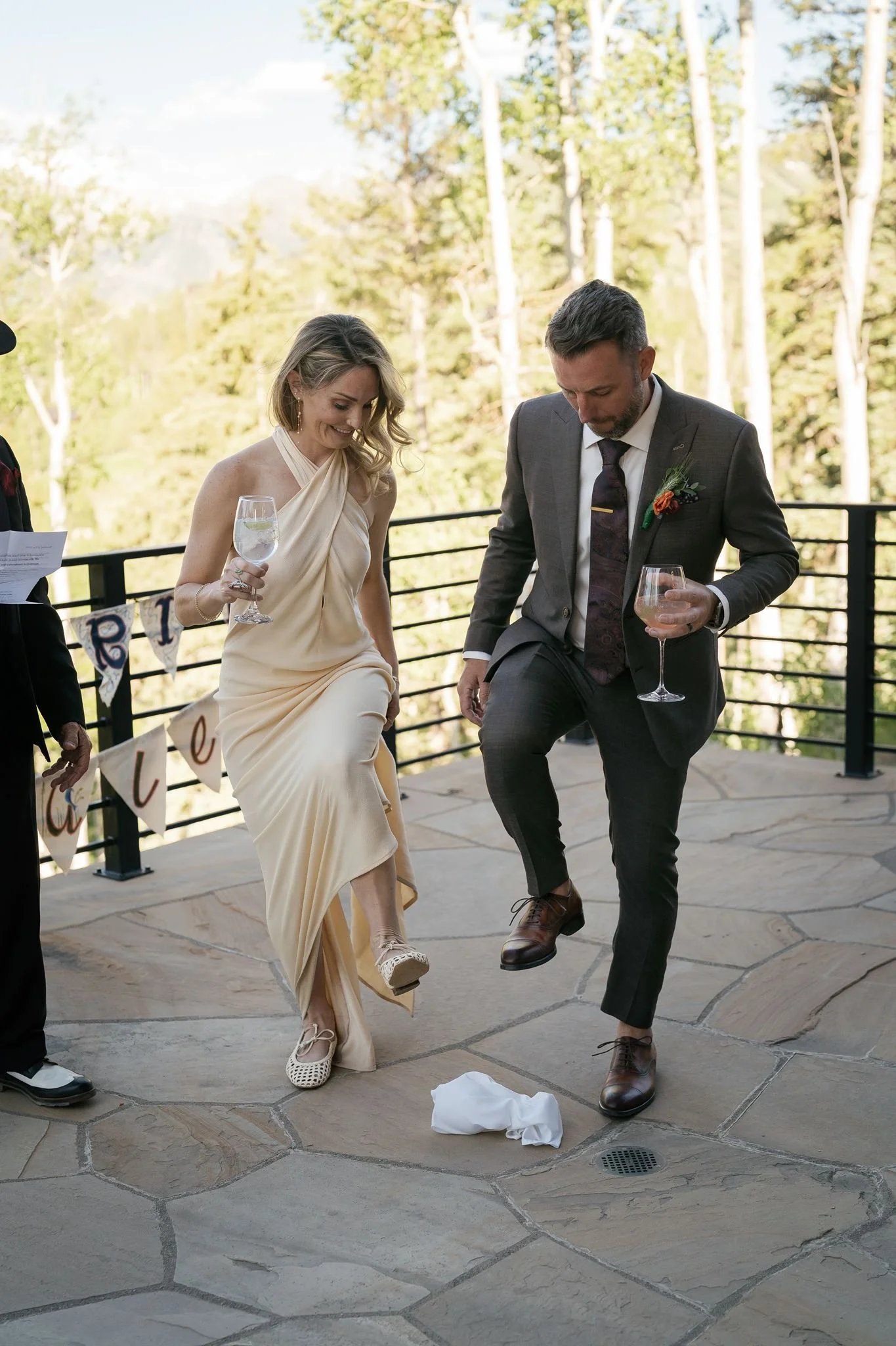 bride and groom smash the glass