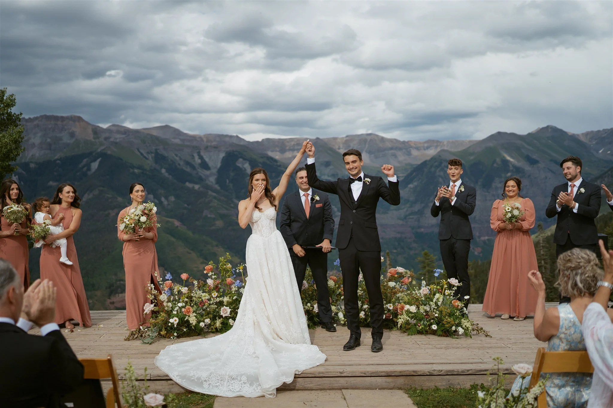 bride and groom celebrate their ceremony concluding at San Sophia Overlook