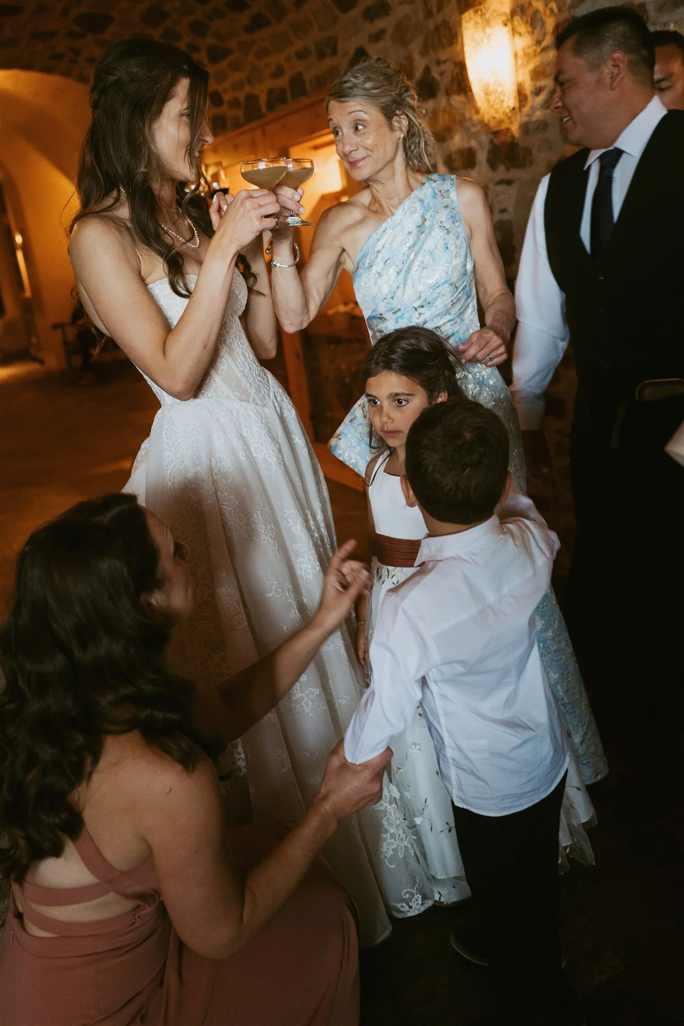 bride cheers with her mother in law
