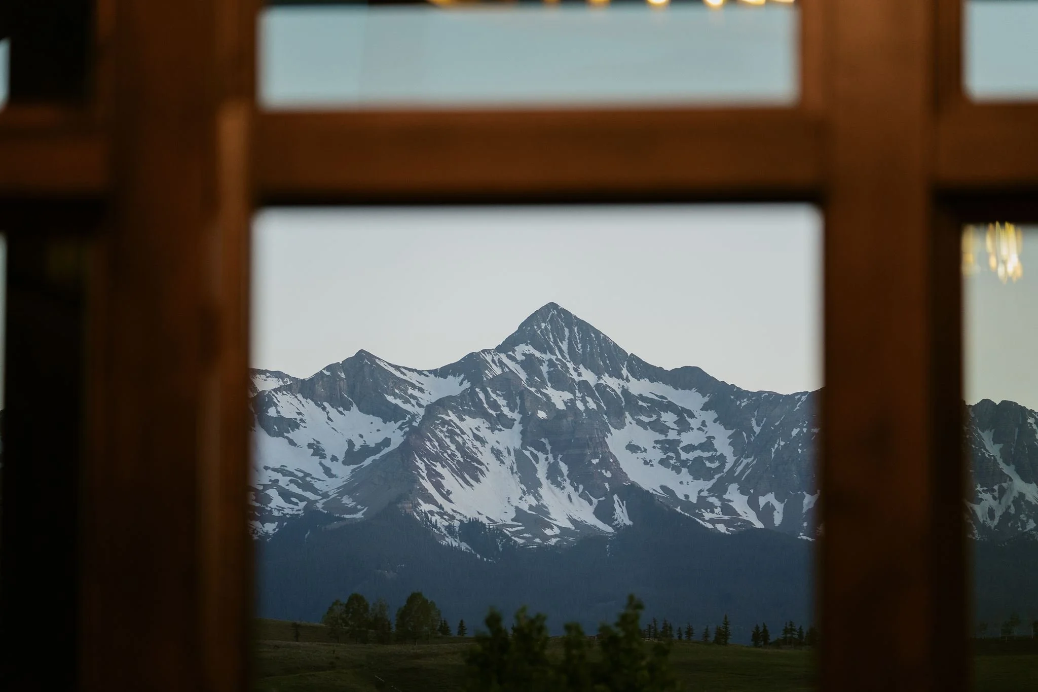 the mountains viewed through a window