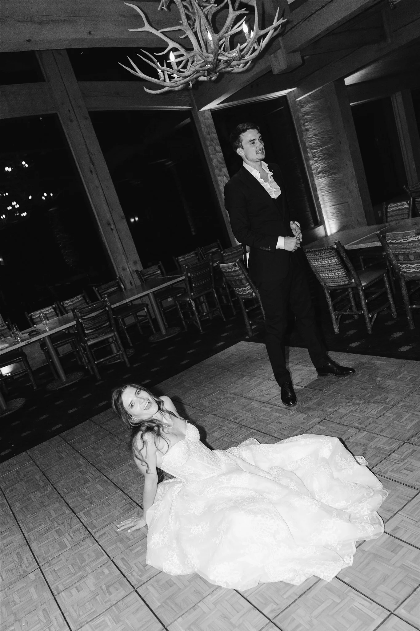 bride sits on the floor after their last dance