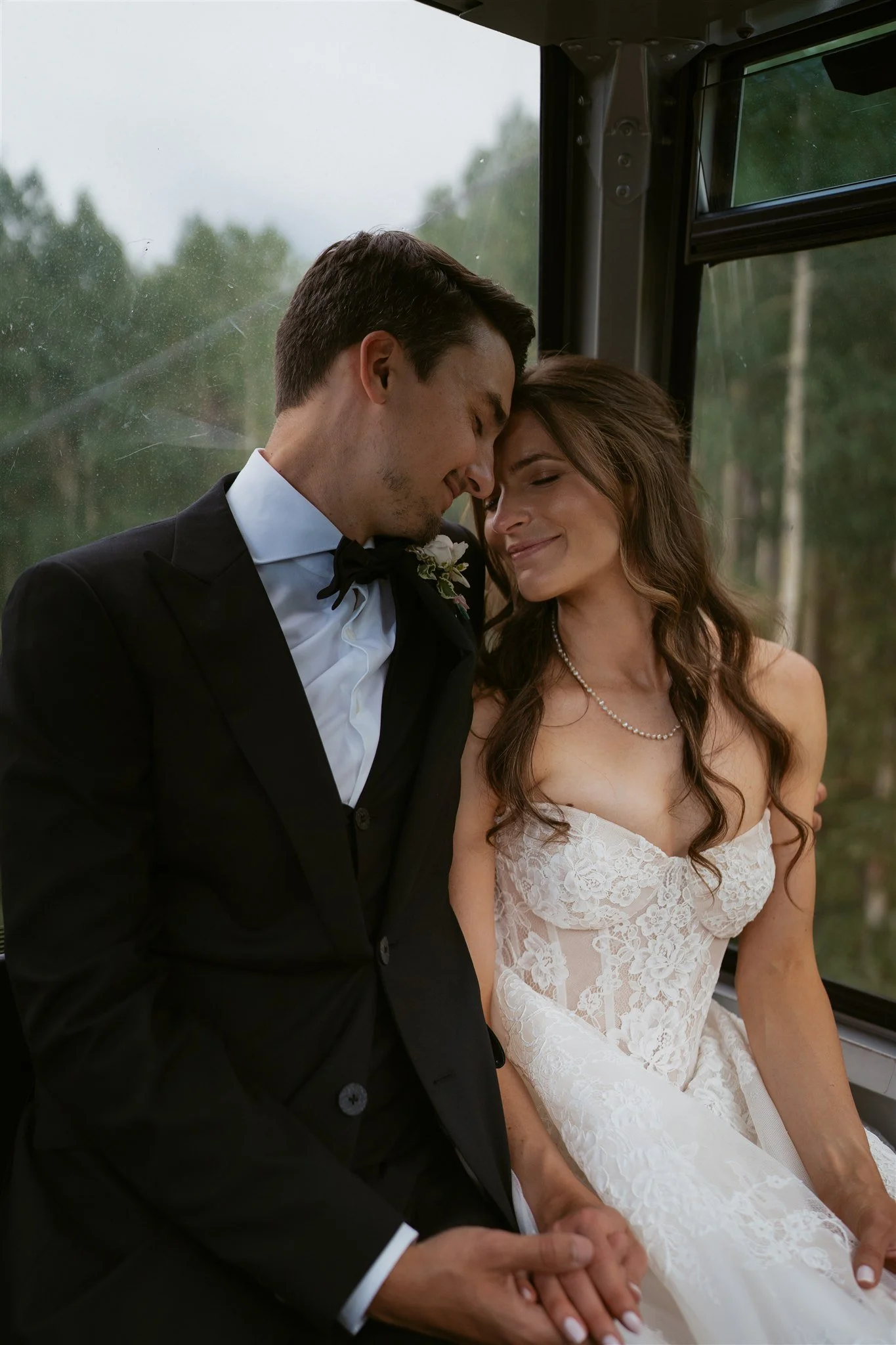 bride and groom on the Telluride gondola