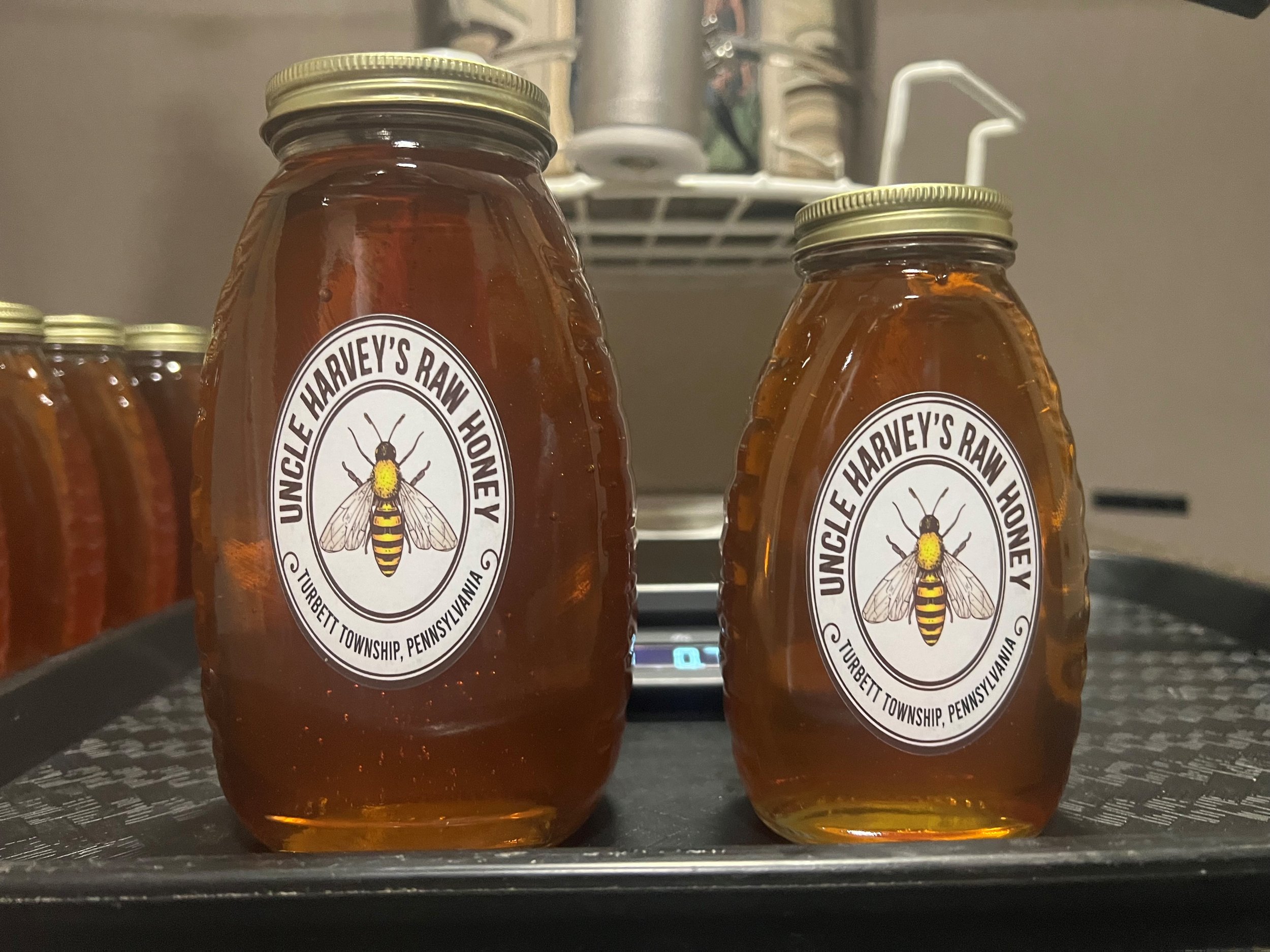 For size perspective see additional photo showing both sizes of jars side by side. One pound jar is on the right.