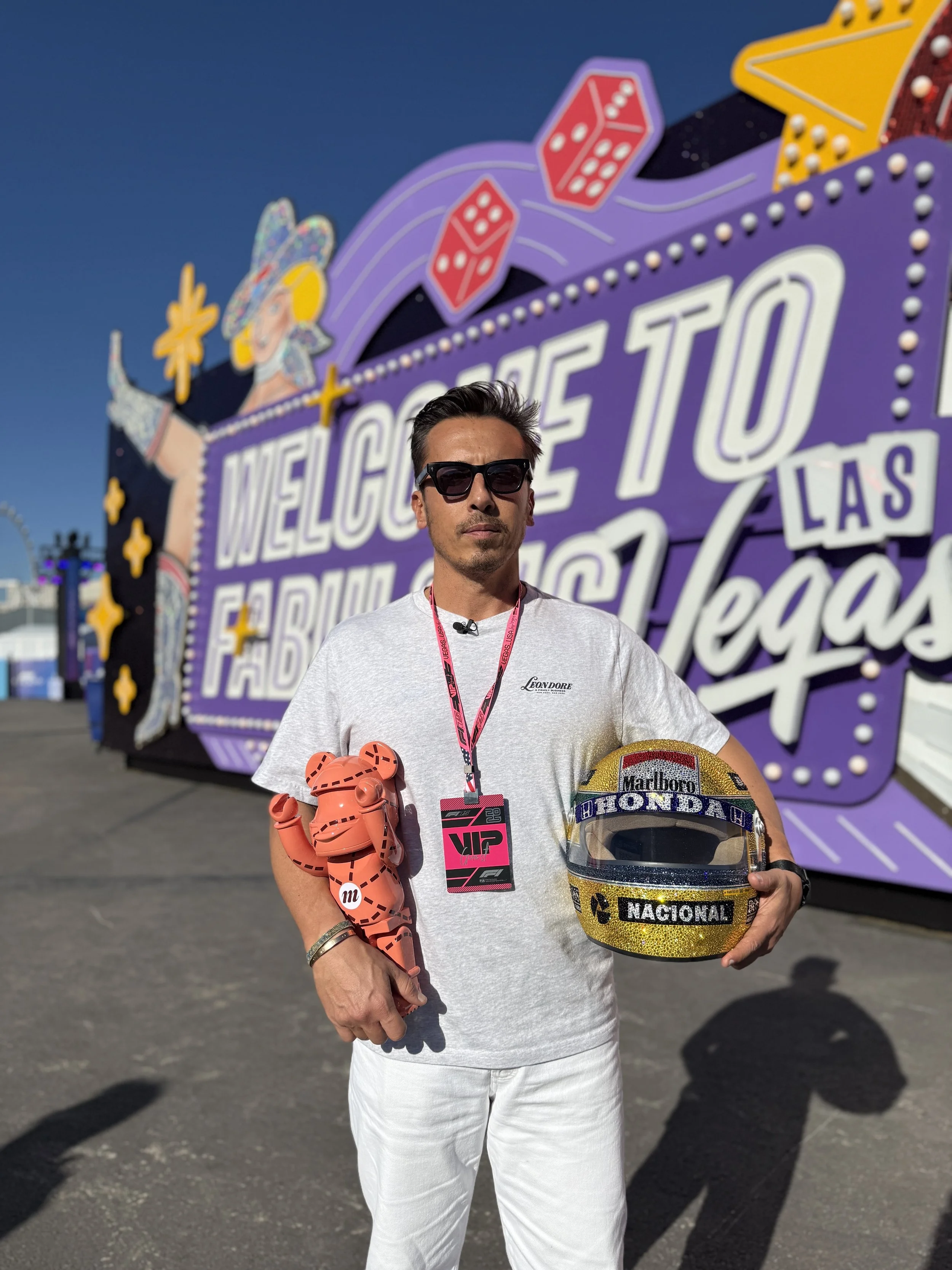 Italian Artist and designer Matteo Machiavelli with the Ayrton Senna Suzuka 88 Crystal Hemet at the Las Vegas Grand Prix 2025