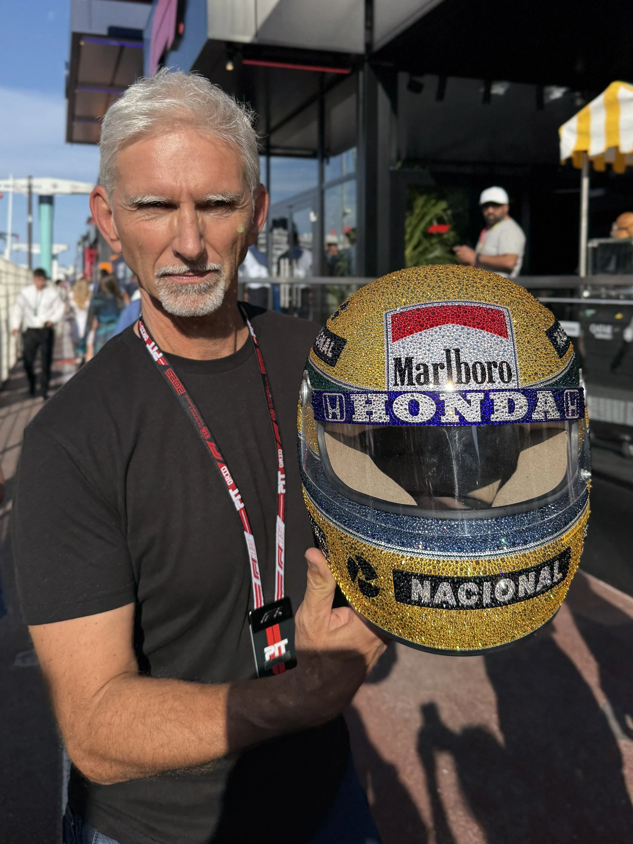 Damon Hill with the unique Ayrton Senna 1988 Monaco Crystal Helmet by STOKESI