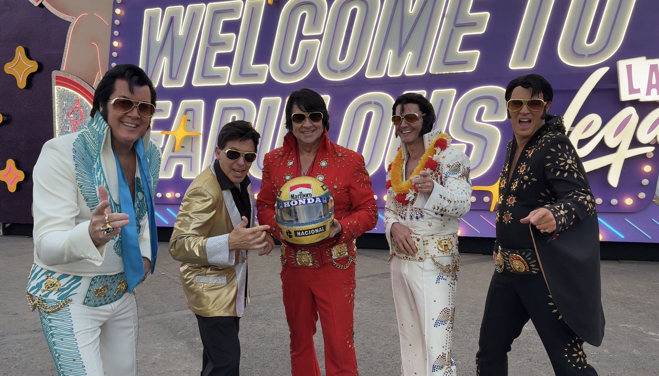 It doesn't get more Las Vegas than 5 Elvis Presley's and an Ayrton Senna Swarovski embellished crystal helmet.