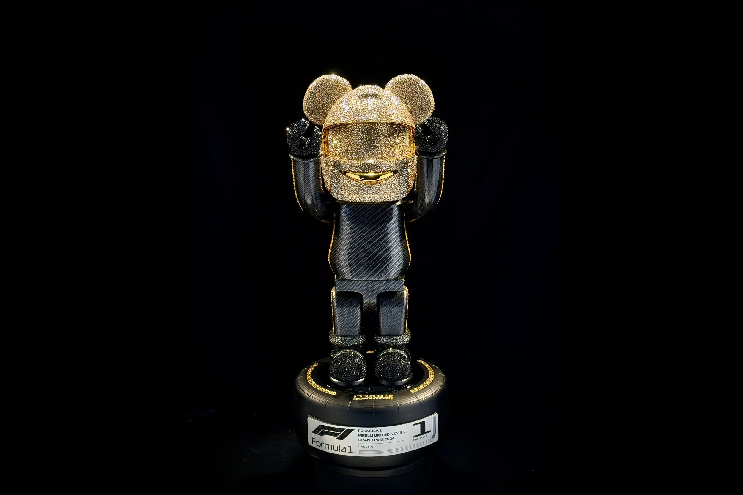 HEROO 65cm tall and made of carbon fibre and over 39,000 genuine Swarovski crystals.
