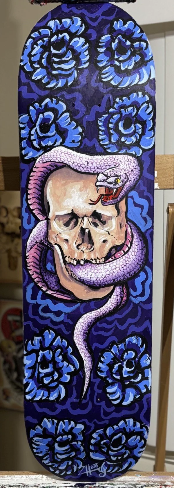 skull and snake board.jpeg