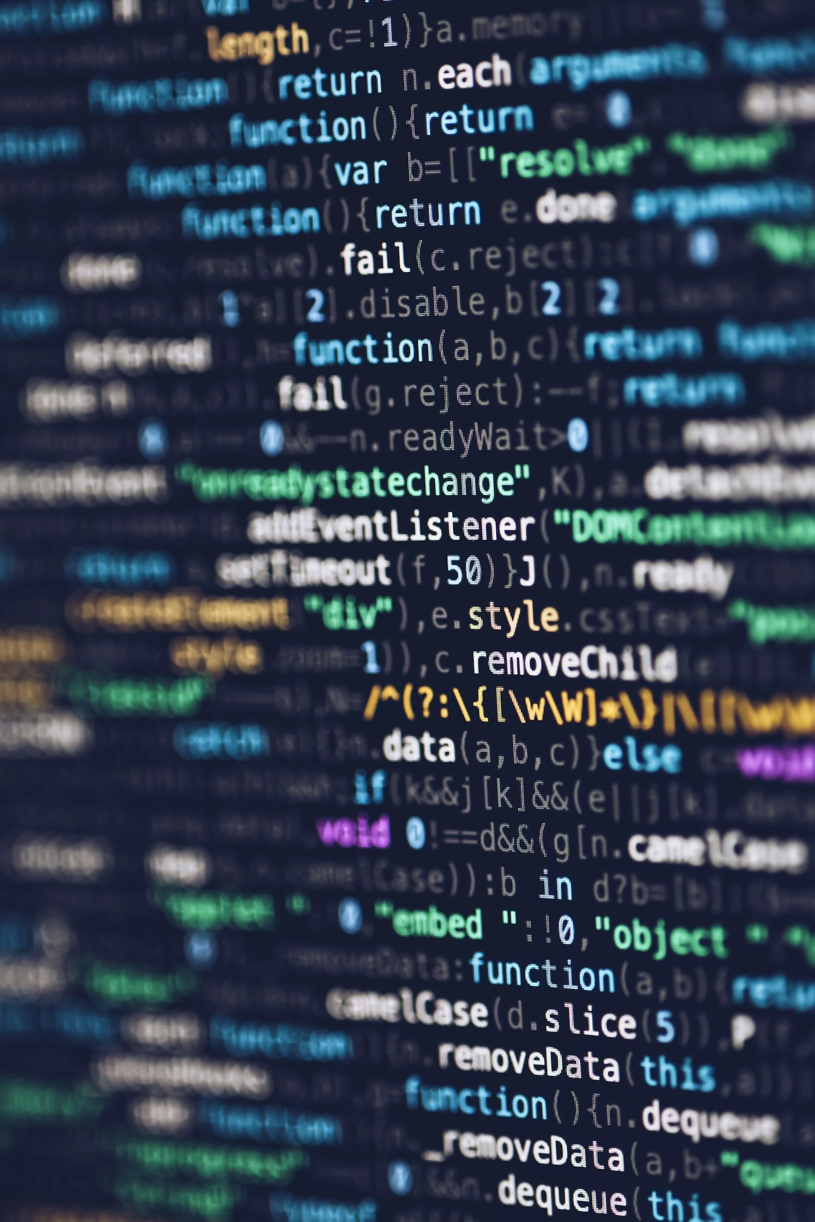 Close-up of computer code with syntax highlighting, focusing on JavaScript functions and programming syntax.