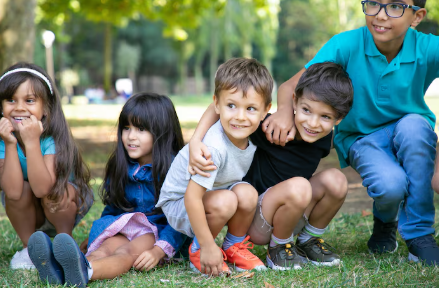 Child making new friends through a group activity