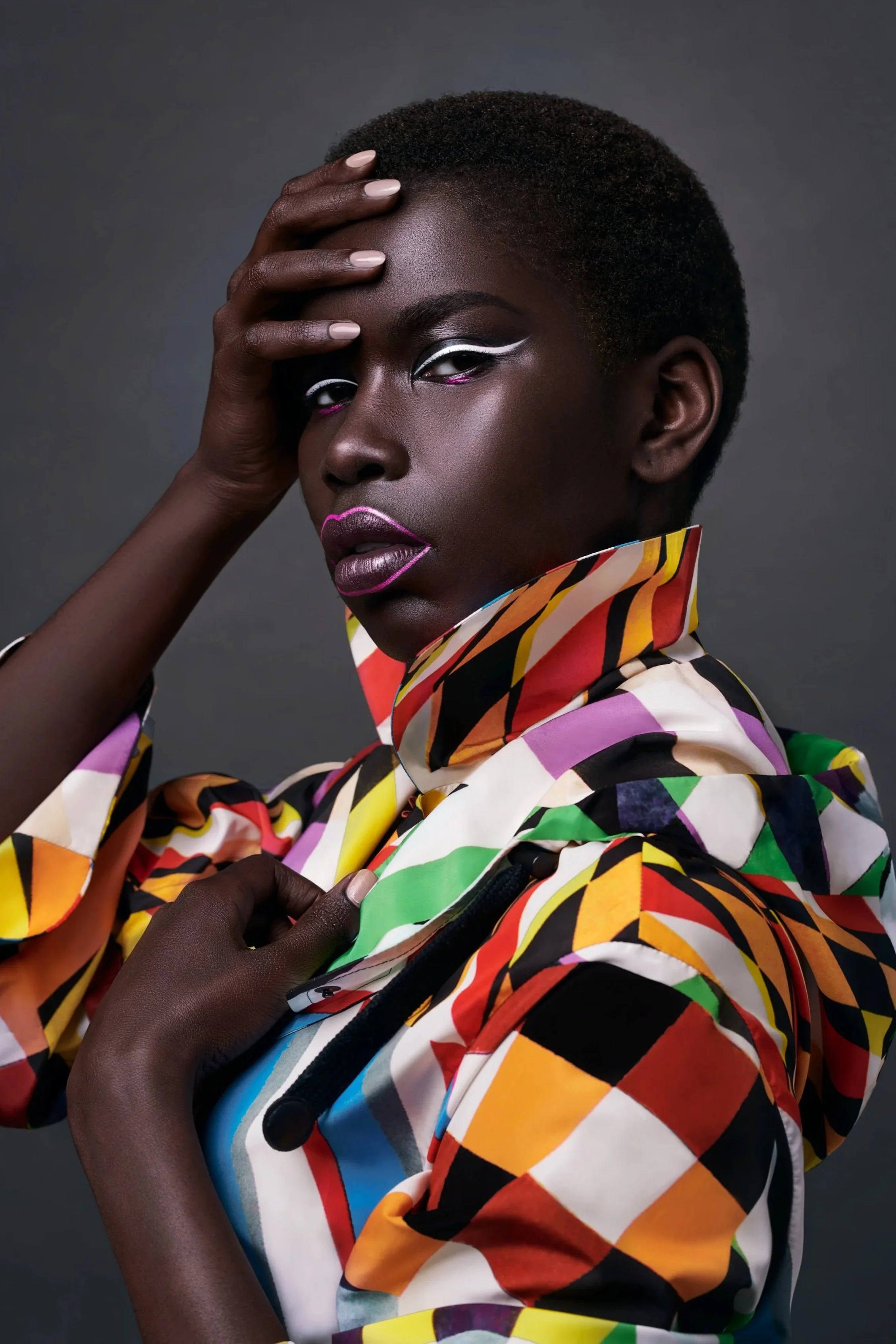 Editorial beauty portrait with bold styling created during a photography workshop focused on lighting, posing, and creative portrait photography