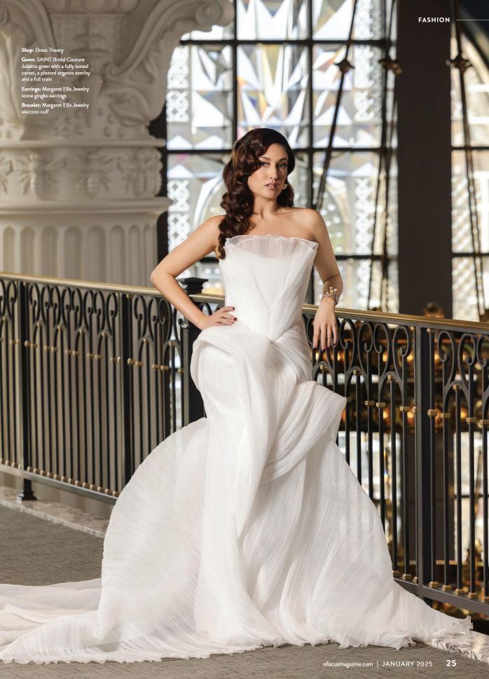 n this captivating bridal shot, the bride’s gown flows like a sculpture against the intricate metalwork and stained-glass background. This editorial showcases the photographer’s ability to blend fashion and art, creating visually dynamic compositions
