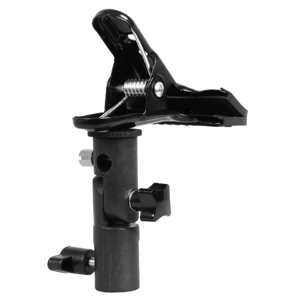 Clamp clip holder for mounting photography reflectors or backdrops.