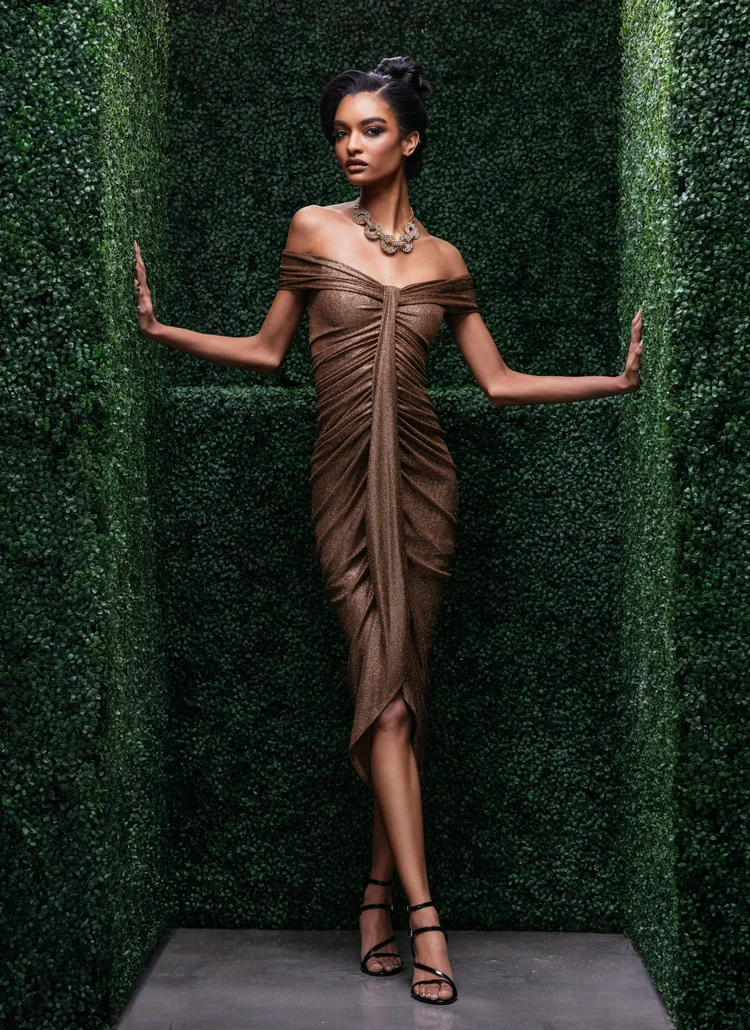 Model in a bronze metallic Prabal Gurung dress between hedge walls for nFocus Magazine's spring cover story, photographed by Nashville commercial photographer Tausha Dickinson