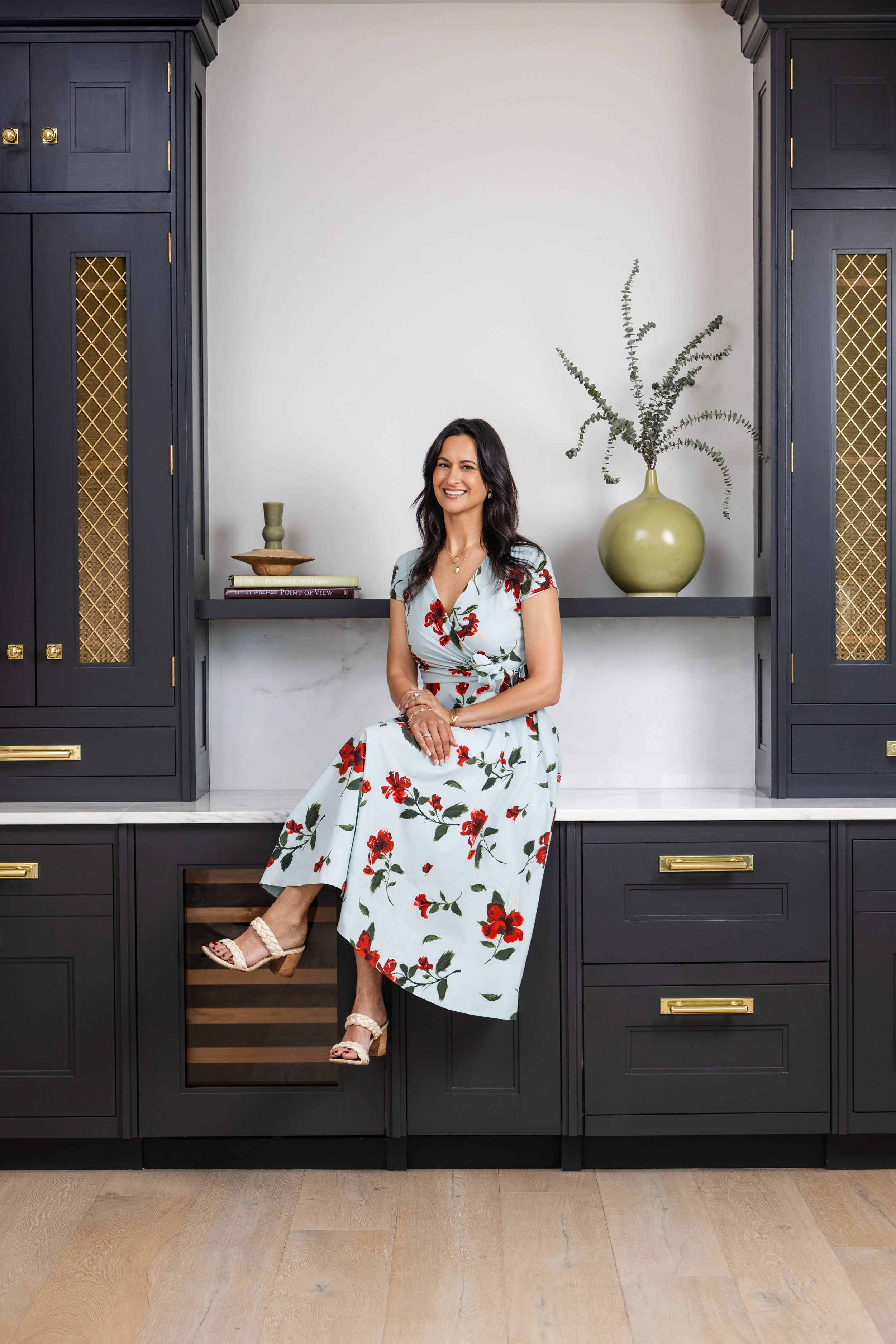 Portrait of Katy for the nFocus Fresh Faces editorial, seated on a dark kitchen counter at The Manning in Nashville, photographed by Tausha Dickinson.