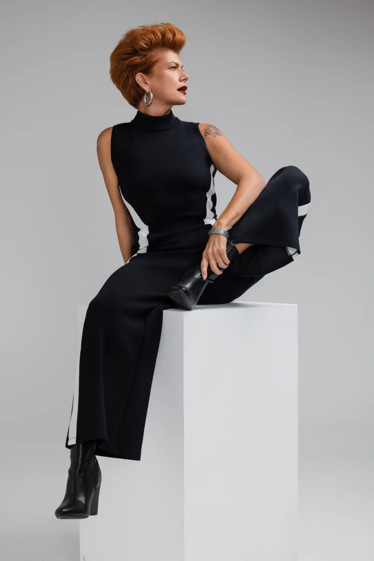 Studio portrait lit with dramatic directional light