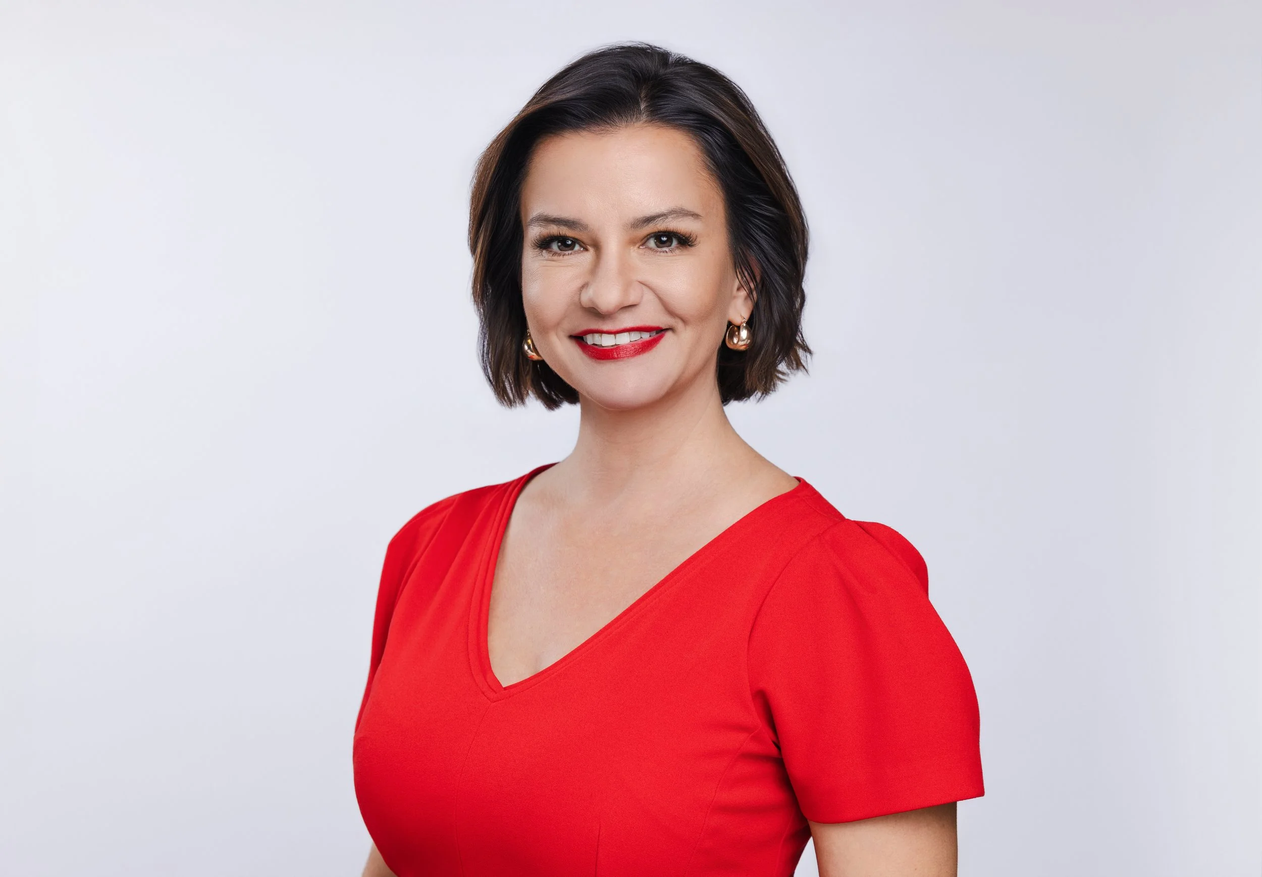 wsmv-female-news-anchor-headshot-red-dress-nashville-tausha-dickinson.jpg