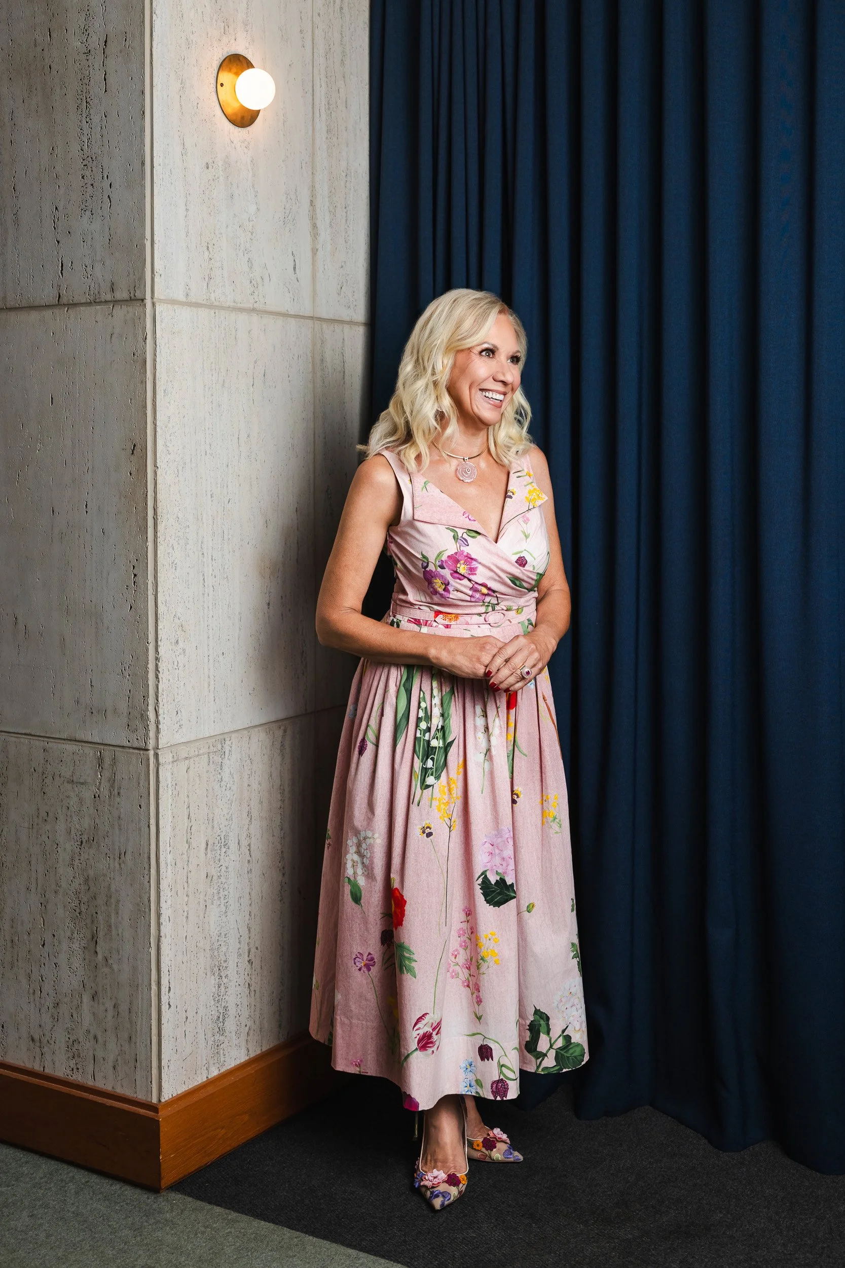 Julia Baker photographed near a navy curtain backdrop at the Fairlane Hotel in Middle Tennessee.