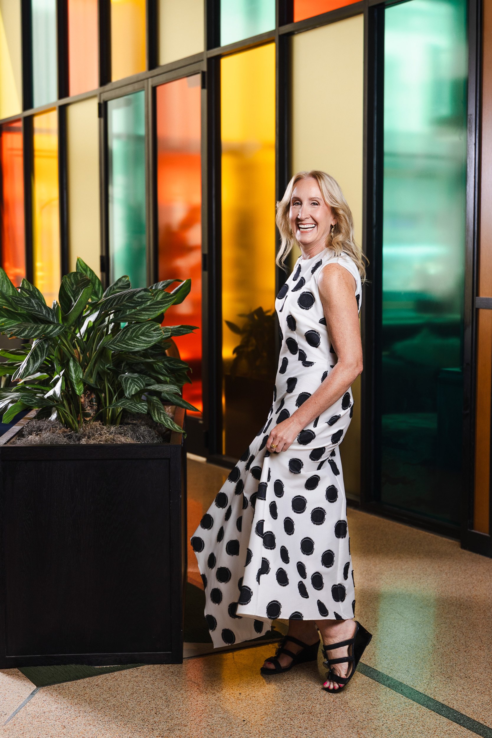 Jennifer Biefel in a sleeveless polka dot dress, photographed by a Franklin TN editorial photographer for nFocus Magazine.