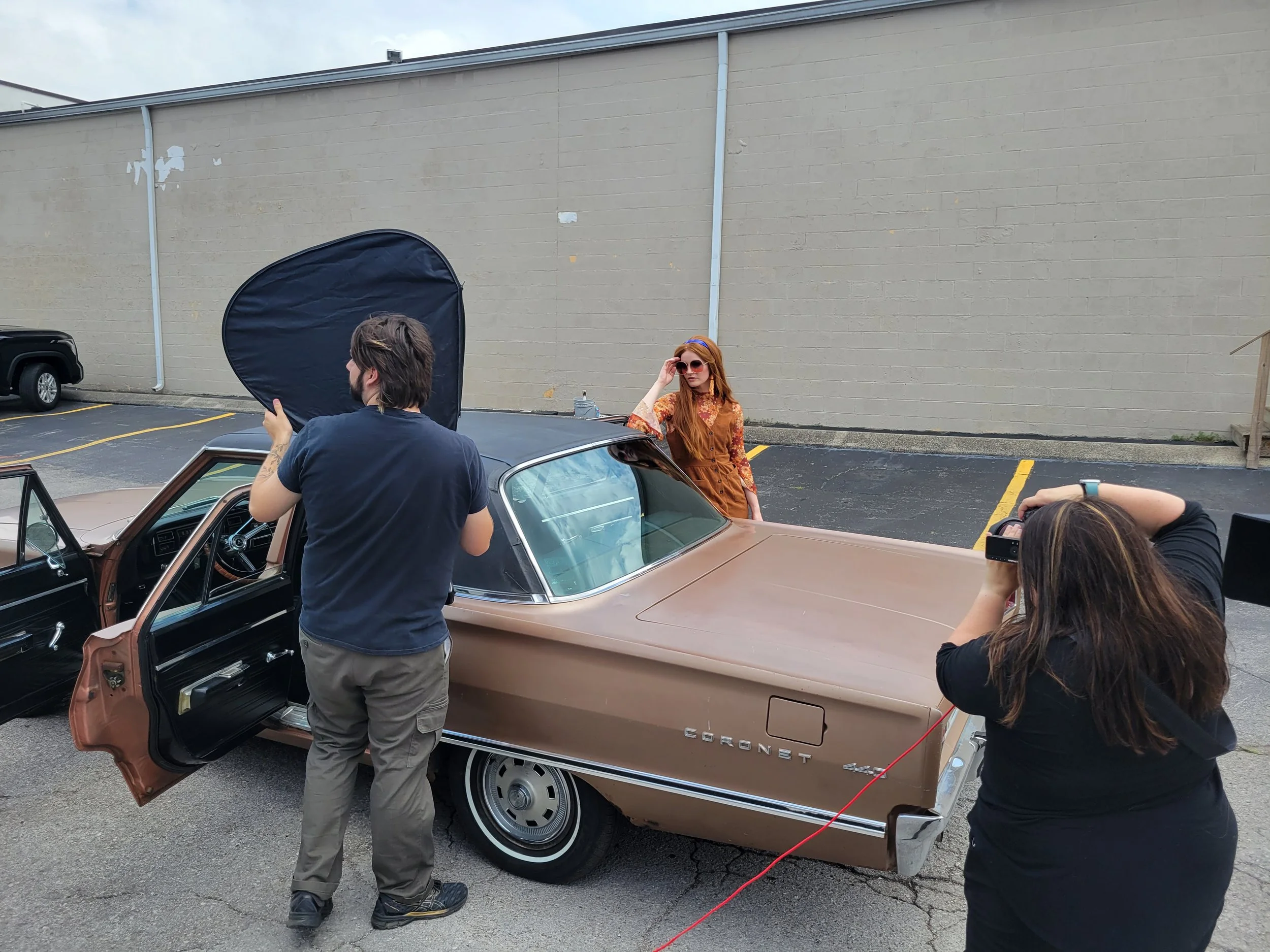 Nashville commercial photographer Tausha Dickinson directing a portrait session in her Franklin TN studio