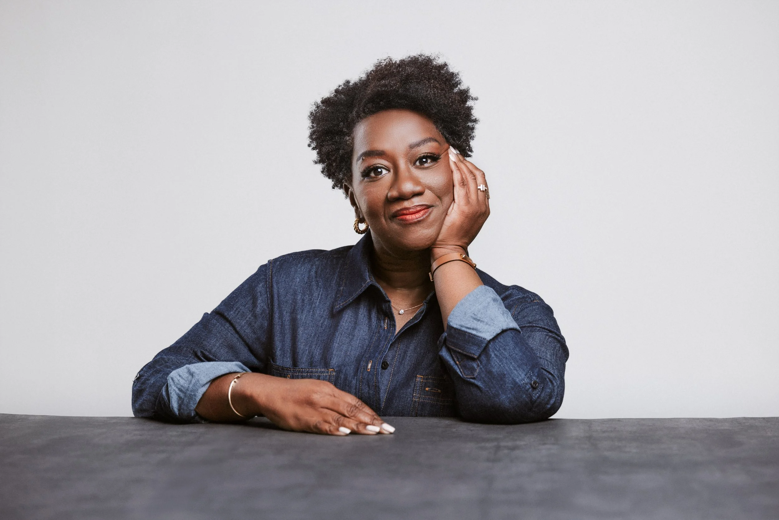 An editorial-style portrait with soul. This relaxed, studio-lit image captures intellect, warmth, and style—designed for those seeking modern branding from a Nashville Commercial Photographer.