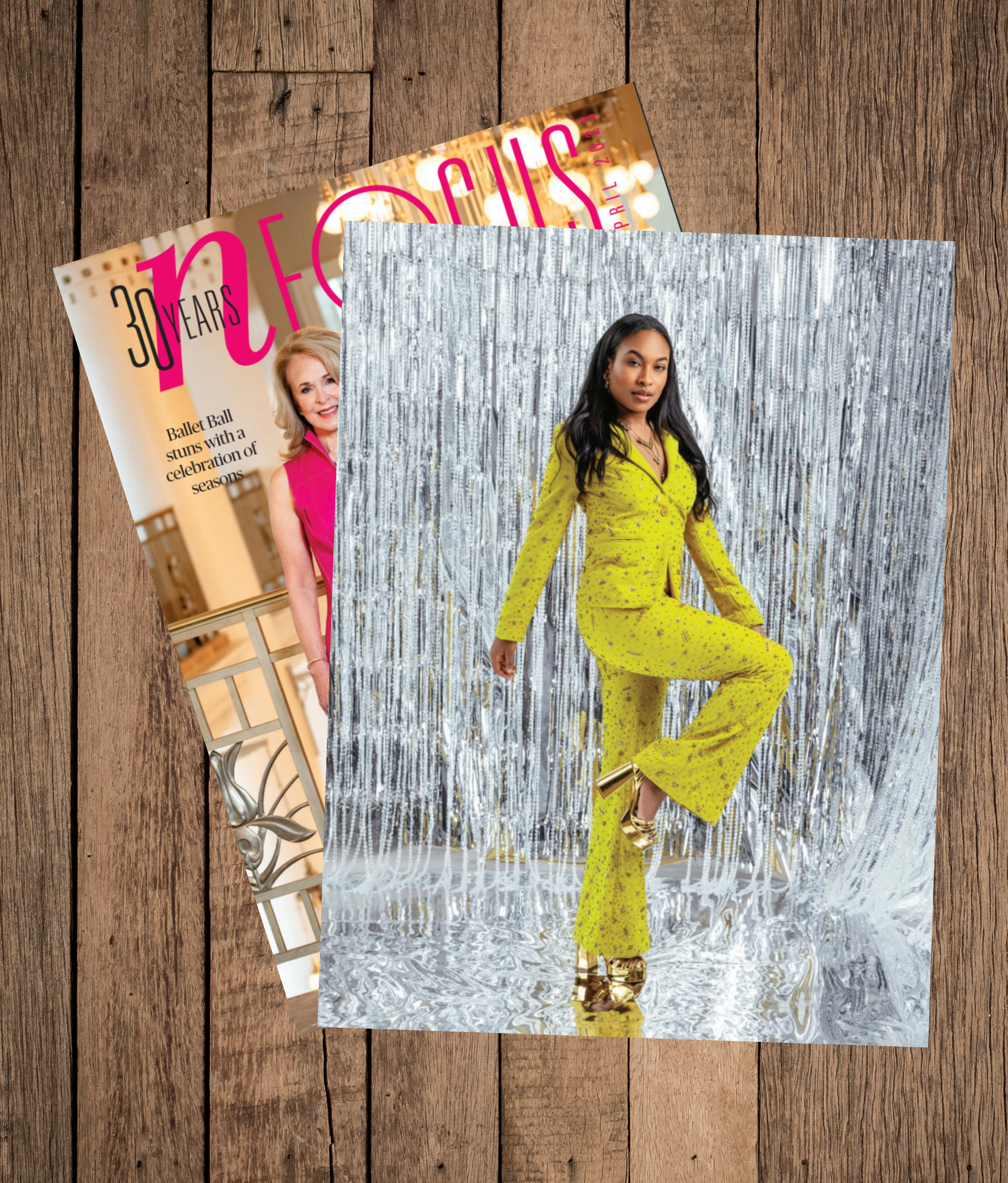 A dynamic fashion portrait featuring a vibrant yellow suit set against a shimmering silver backdrop. The bold styling and playful pose reflect creative, editorial photography at its finest. Nashville Fashion Photographer delivering eye-catching, on-t