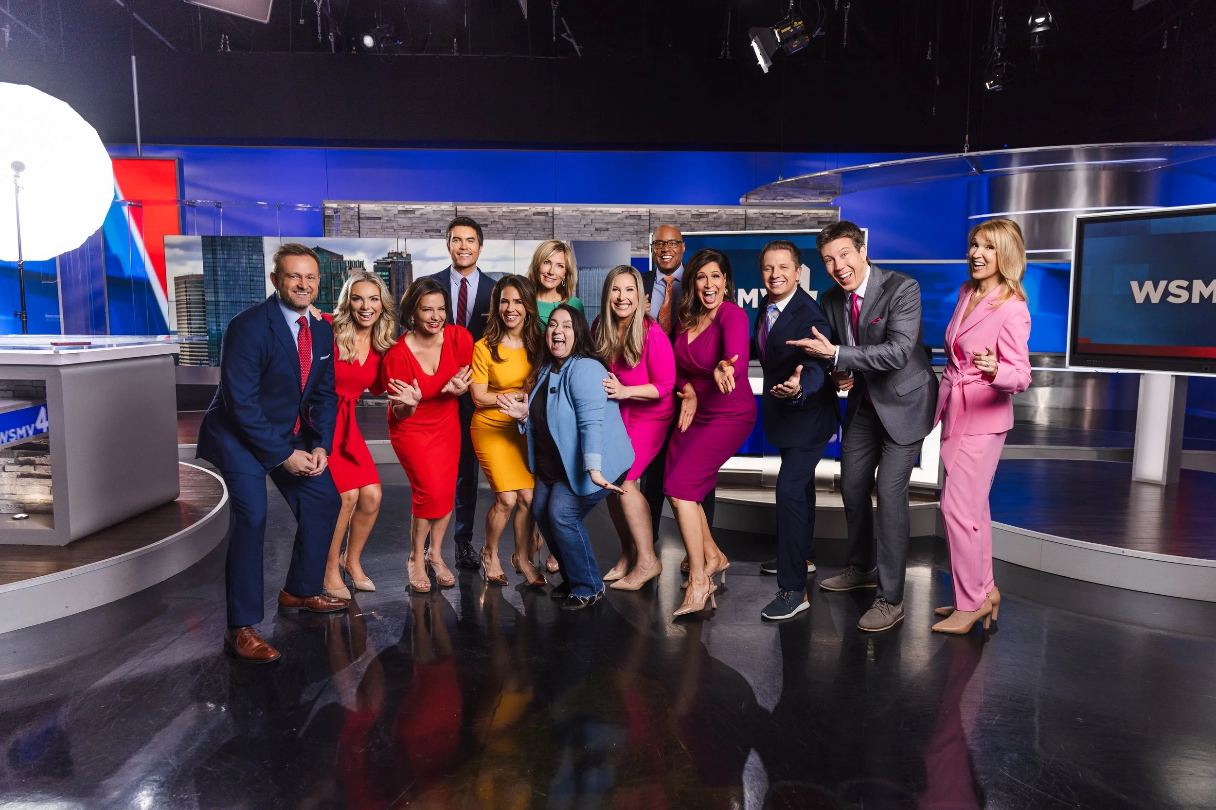 Group portrait of the WSMV news team with photographer Tausha Dickinson during a studio photo session in Nashville.