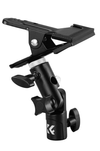 Clamp clip holder for mounting a reflector to a stand