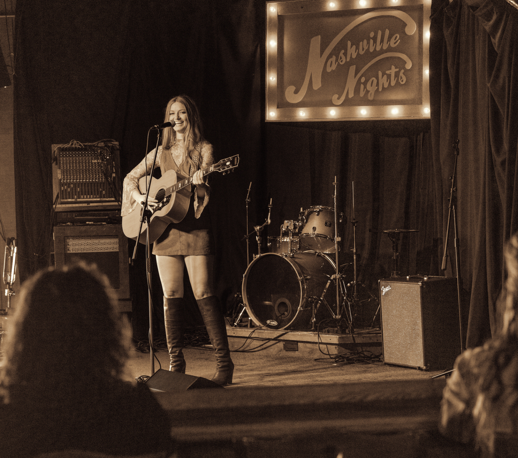 Mary Louise performing at Tempo by Hilton in Nashville photographed by Nashville commercial photographer Tausha Dickinson