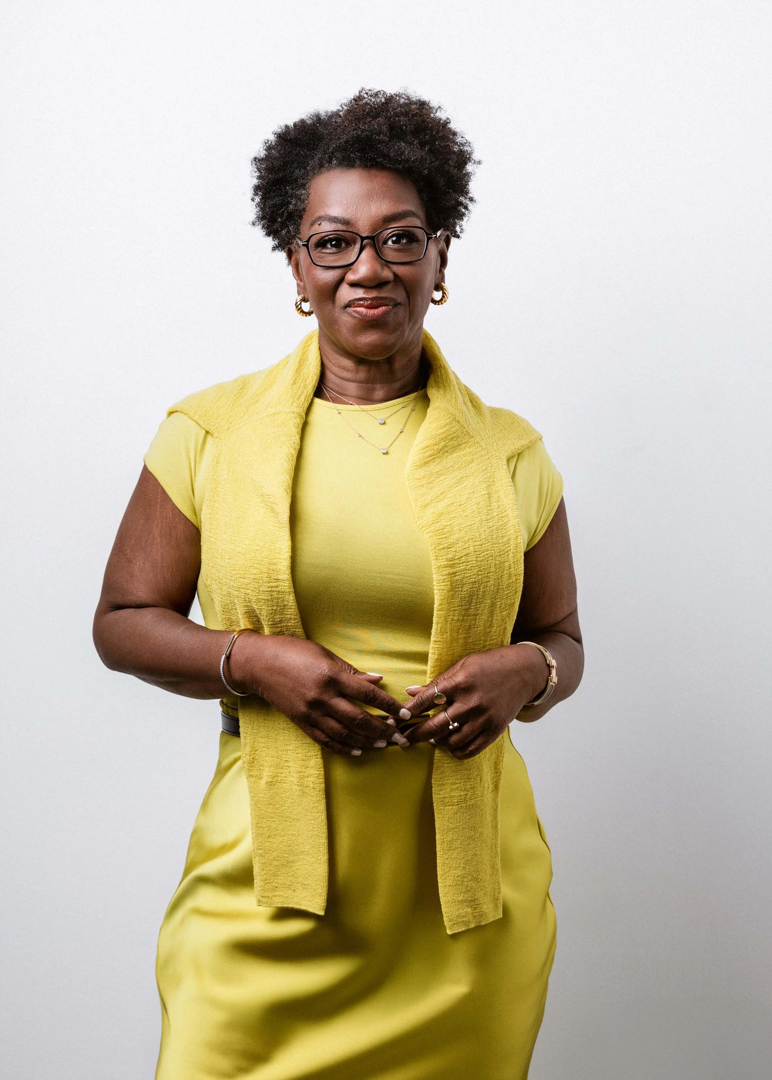 This modern studio portrait features refined styling and a bold color palette. A poised expression and intentional wardrobe create a clean, elevated image by a Nashville Photographer for professional use.