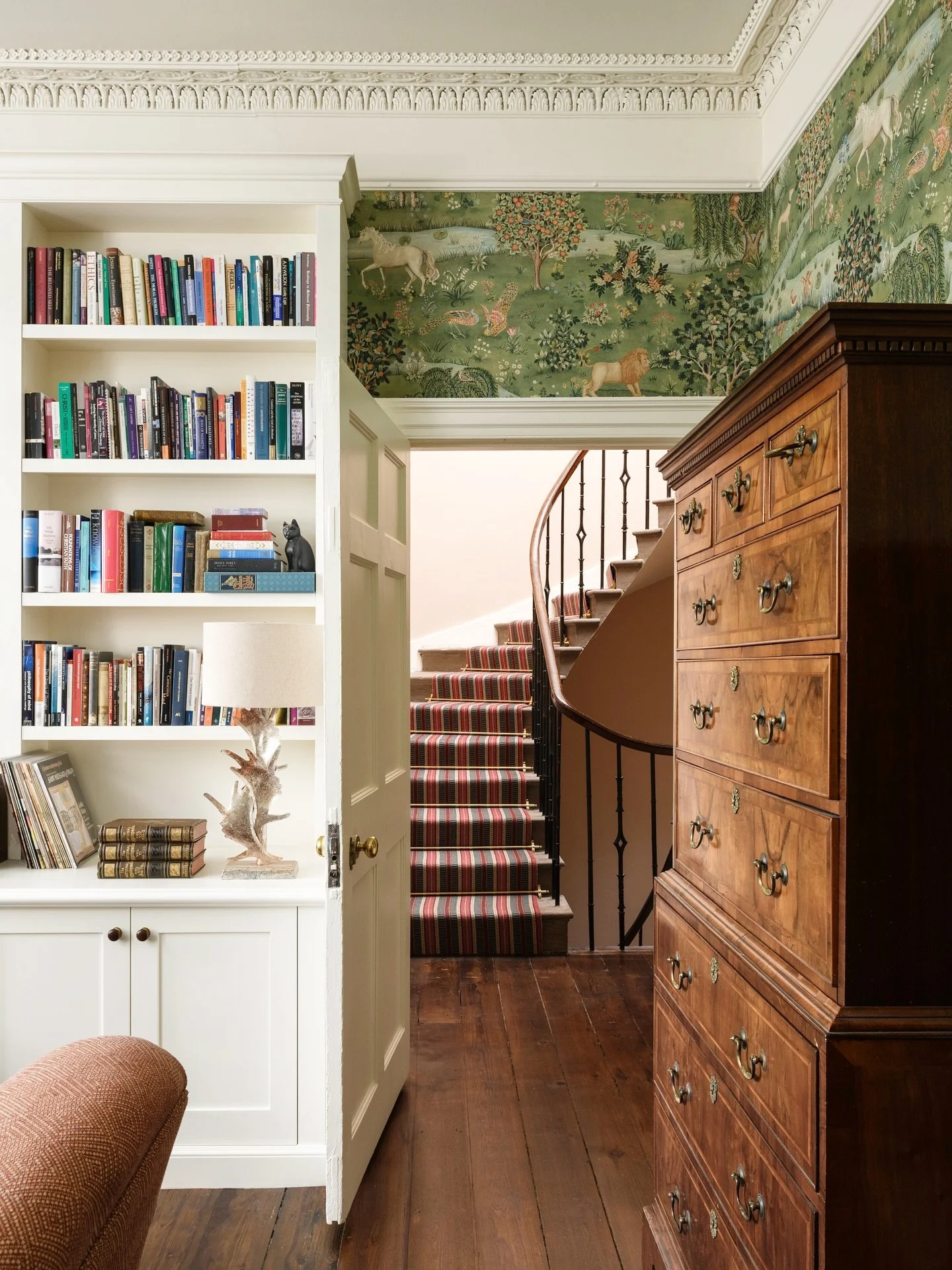 The wallpaper really steals the show in our client&rsquo;s first floor library, a &ldquo;grown up only&rdquo; space in this busy family home. With two large windows at the front the light floods in which helps, but this is a perfect example of timele