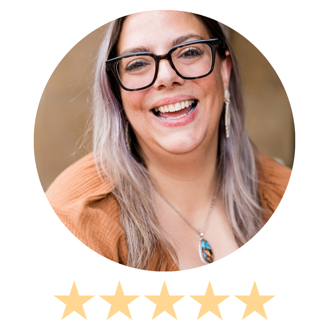 woman smiles in glasses