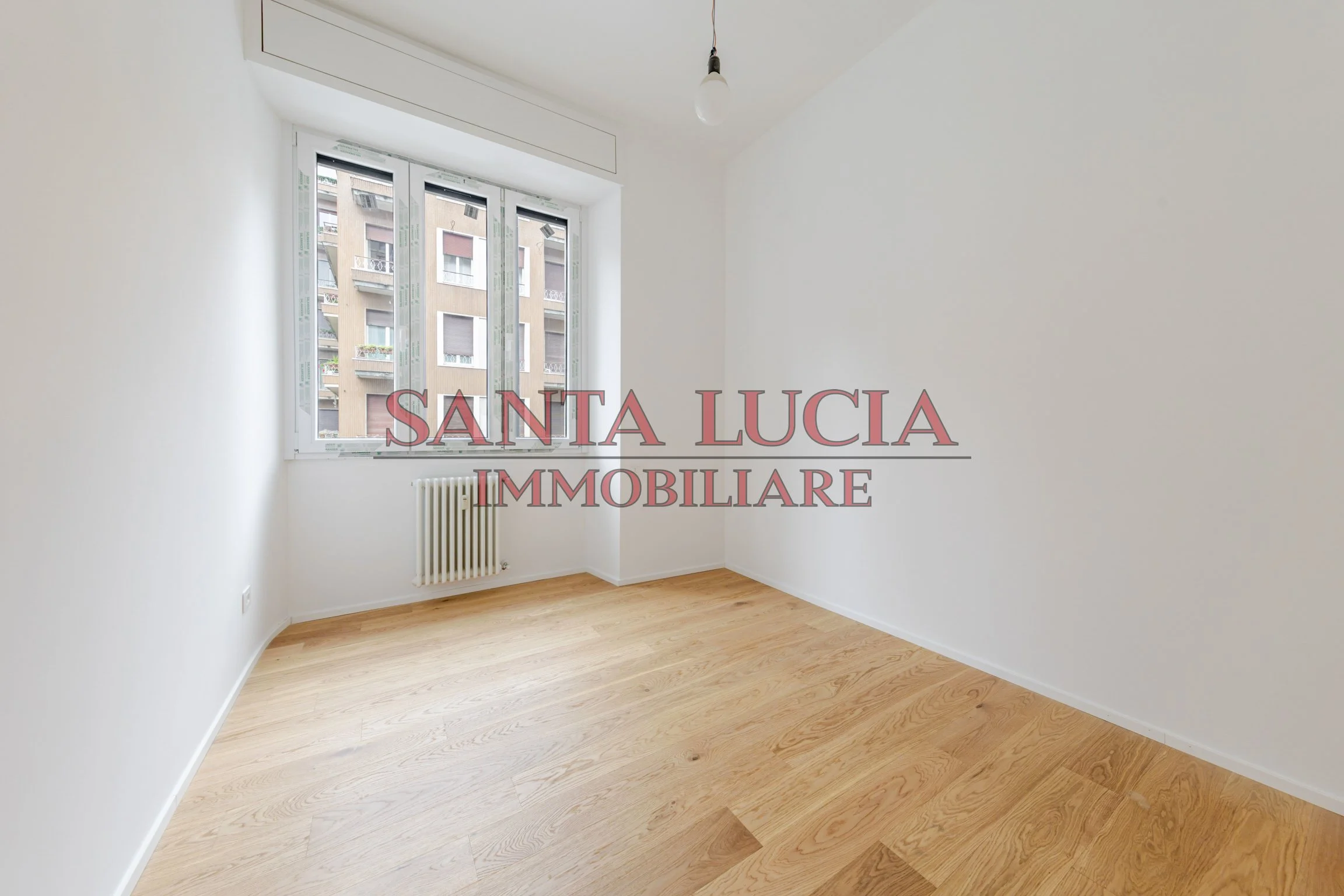 Via Mauro Macchi 58 - Trilocale ristrutturato con terrazzo e posto auto - Santa Lucia Immobiliare