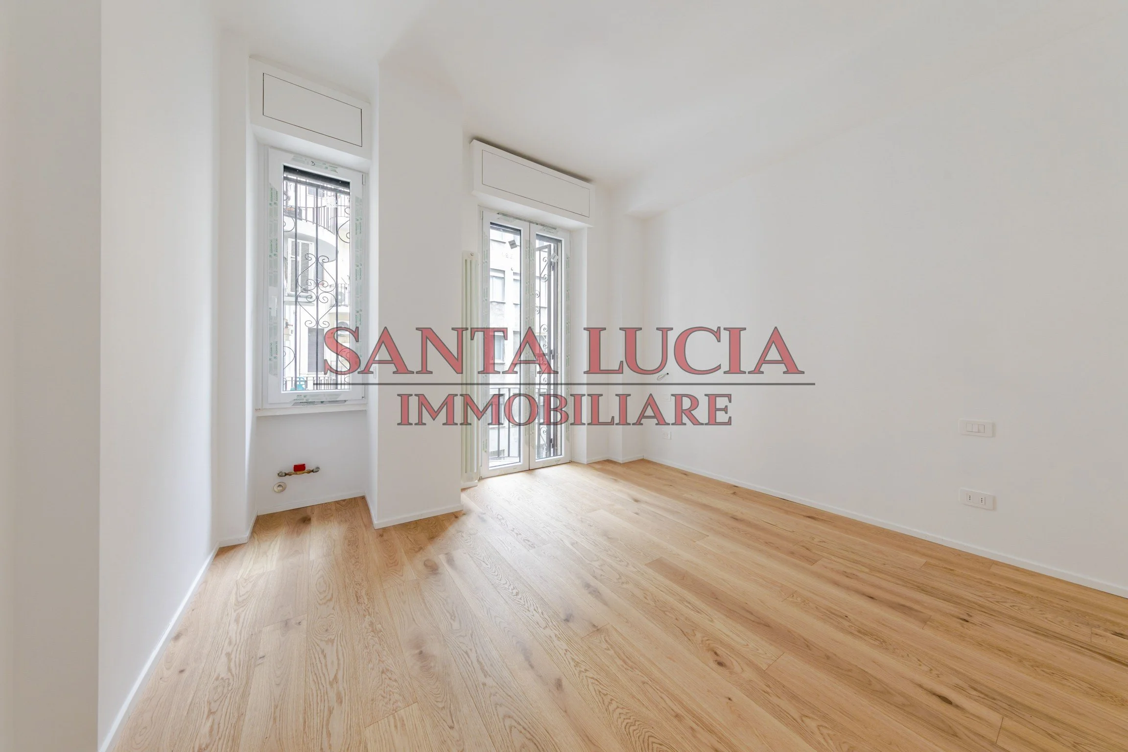 Bilocale ristrutturato con posto auto incluso - Via Mauro Macchi 58- Santa Lucia Immobiliare