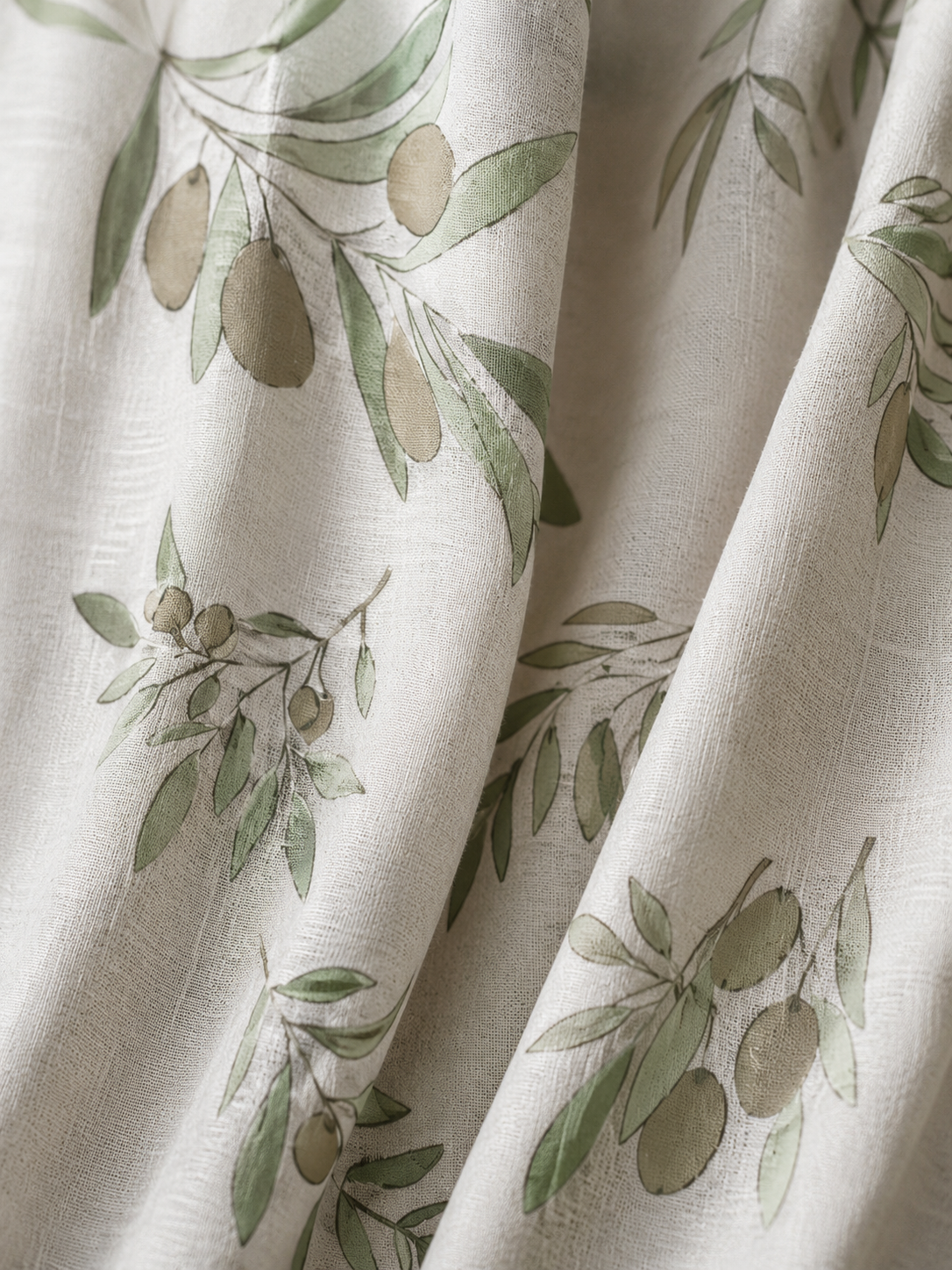 Close up of olive branch panel on curtains