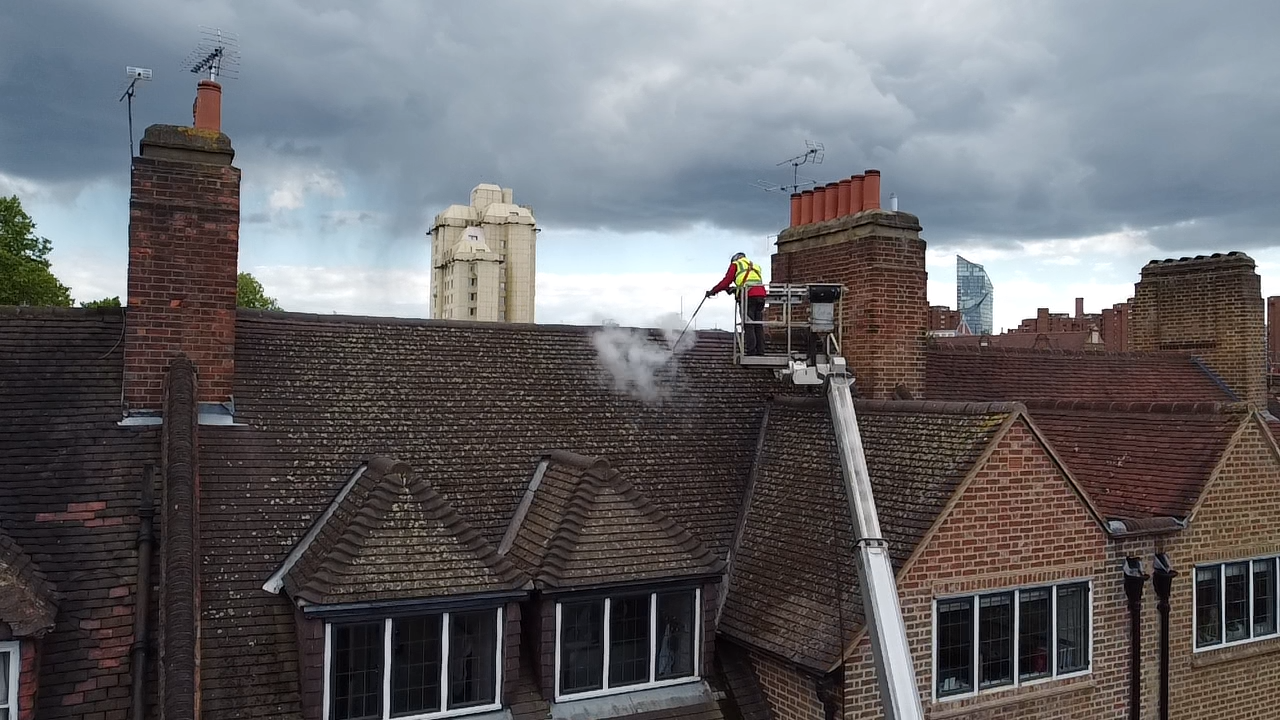 Roof cleaning with cherry picker in Chelsea