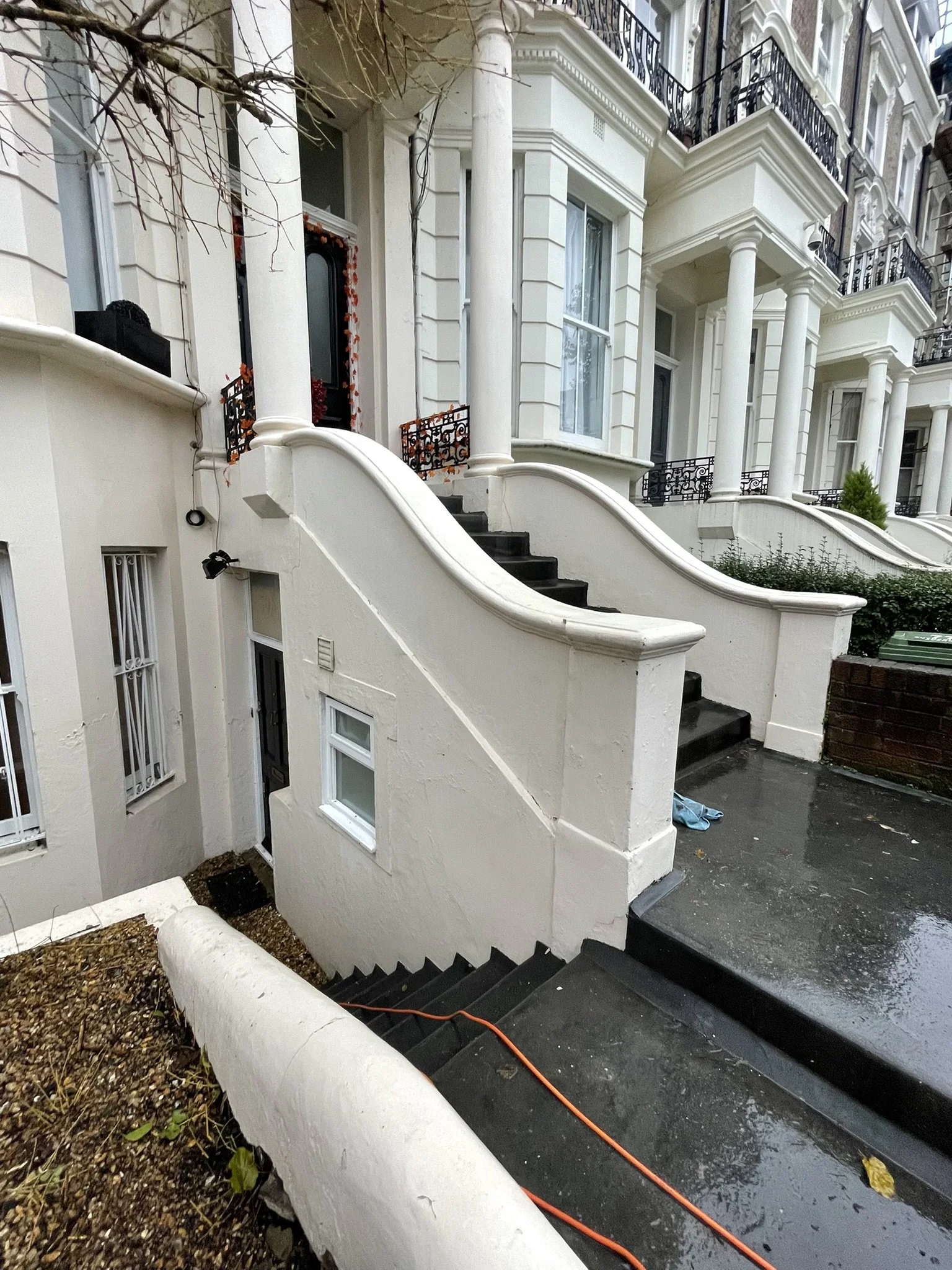 Painted masonry after cleaning