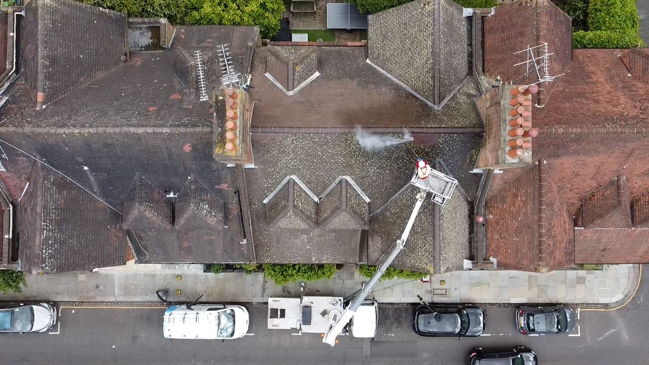 Roof cleaning with cherry picker in Chelsea