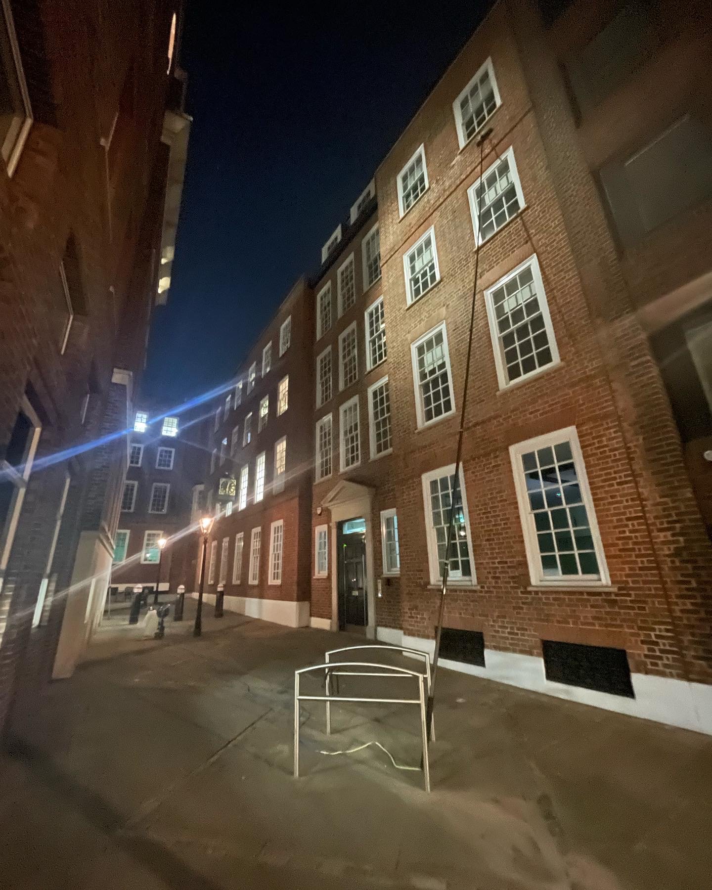 Window cleaning a large office block in Central London