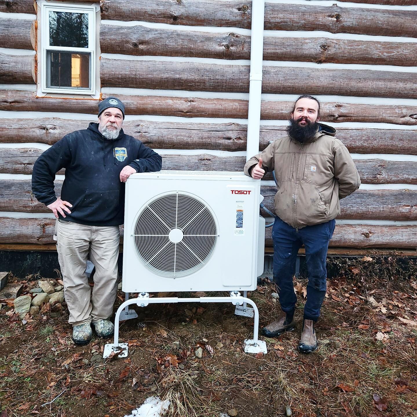 A 24K Ceiling Cassette Install in a custom Log Cabin built from trees harvested on the land!! What an amazing space a heating system setup (check out the giant heat sink stove!) #efficiency #heat #woodstove #heatpump #nh #vt #sevca #efficiencyvt #eco