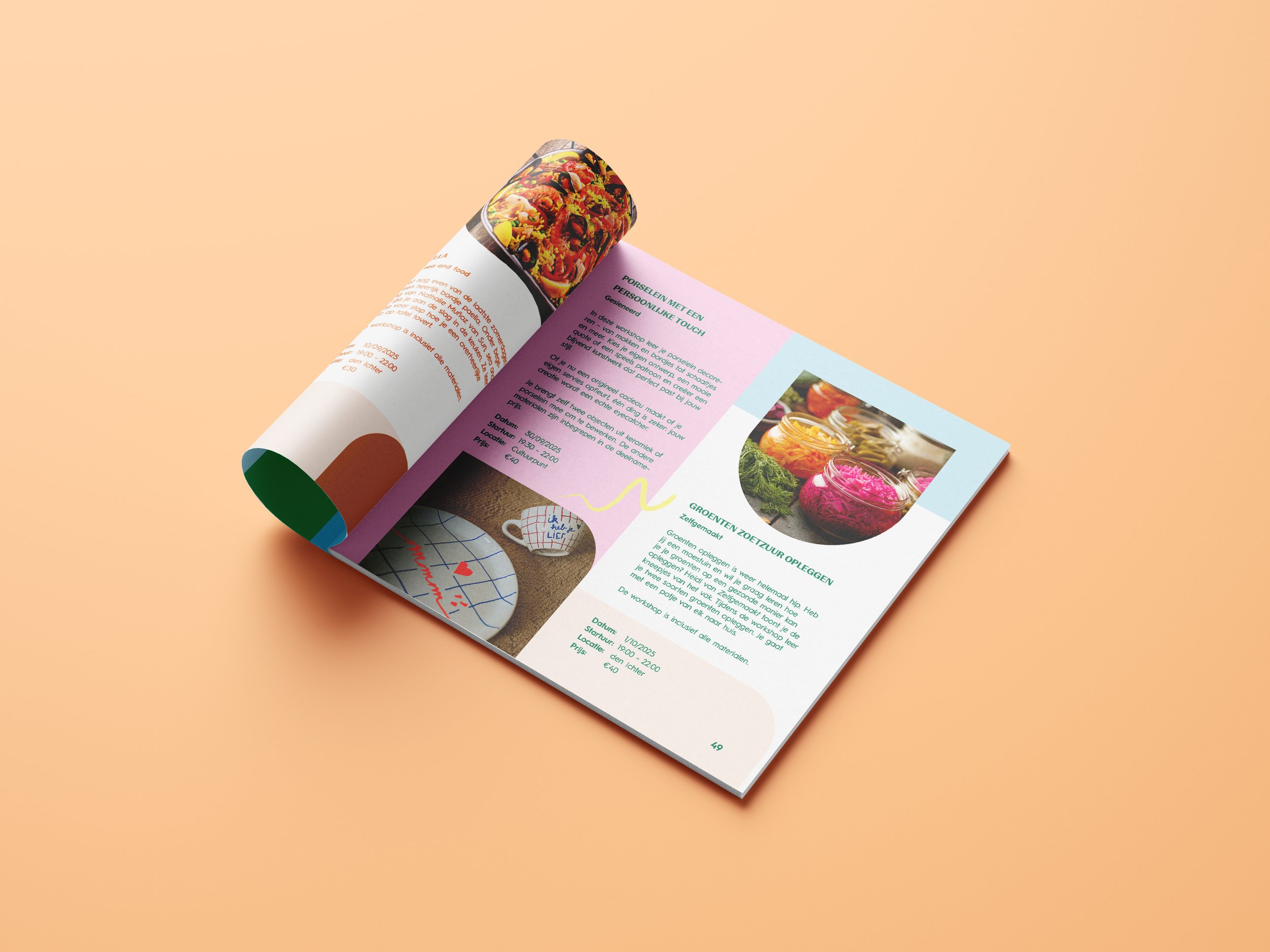 Open colorful magazine on a peach-colored surface, showing pages with text, images of food items including jars of colorful pickled vegetables, decorative dish, and a mug with a design.