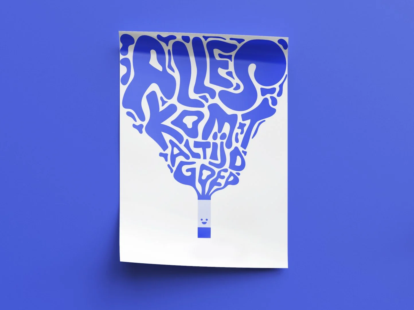 Paper with blue cutout design of a pencil shaped as smoke, featuring stylized text 'ALLES KOMT ALTIJD GOED' at the top and smiley face at the pencil tip.